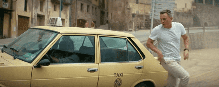 Daniel Craig getting out of a taxi in the new advert for Heineken released on January 14, 2020. | Source: YouTube/Heineken