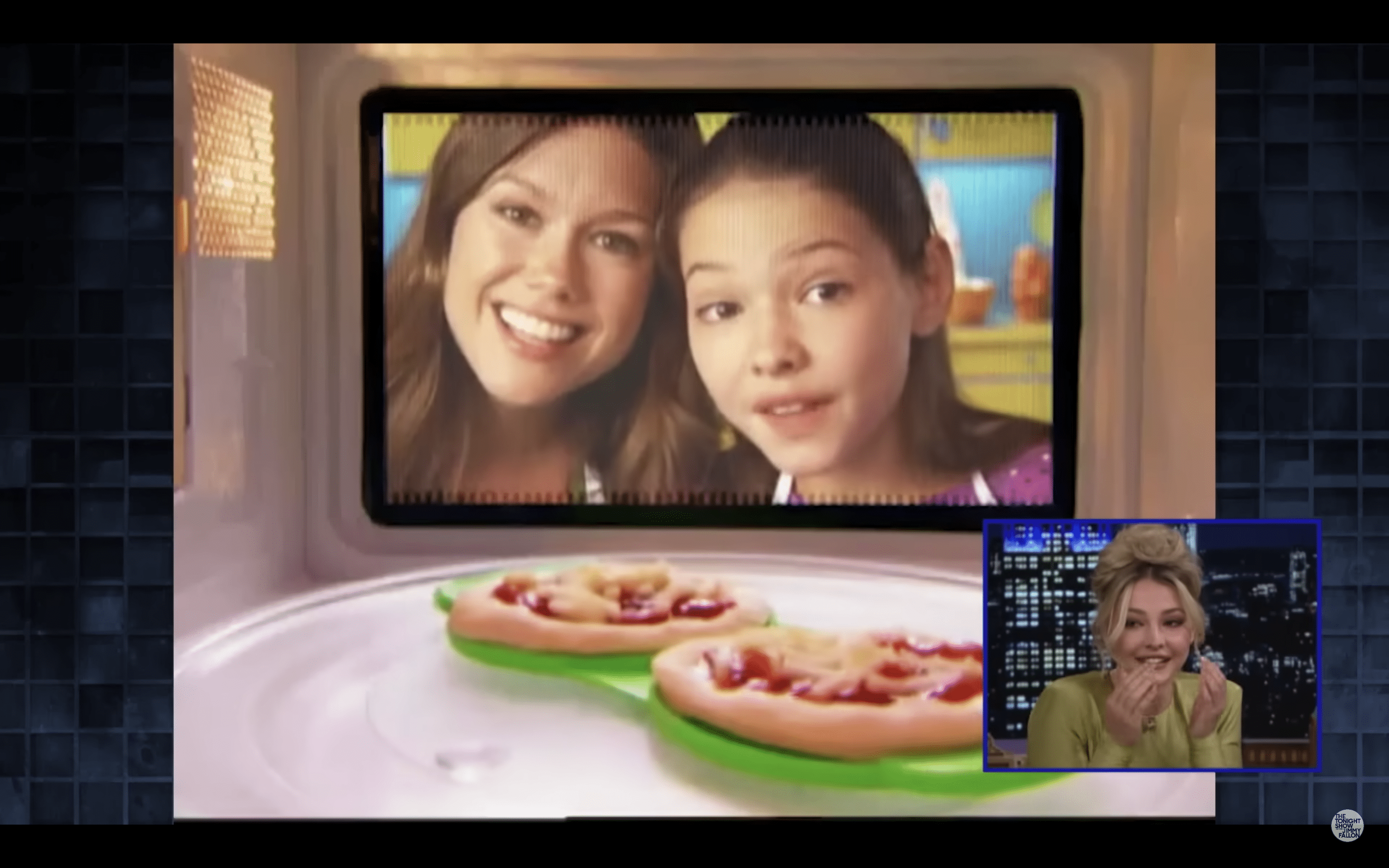 Madelyn Cline reacting to a Chuck E. Cheese commercial she starred in as a kid | Source: YouTube/The Tonight Show Starring Jimmy Fallon