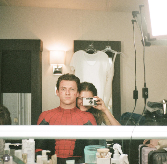 They never explicitly told the world they were together. In this photo, Zendaya and Tom Holland posed backstage while filming "Spider-Man: No Way Home" on September 1, 2021. | Source: Instagram/tomholland2013