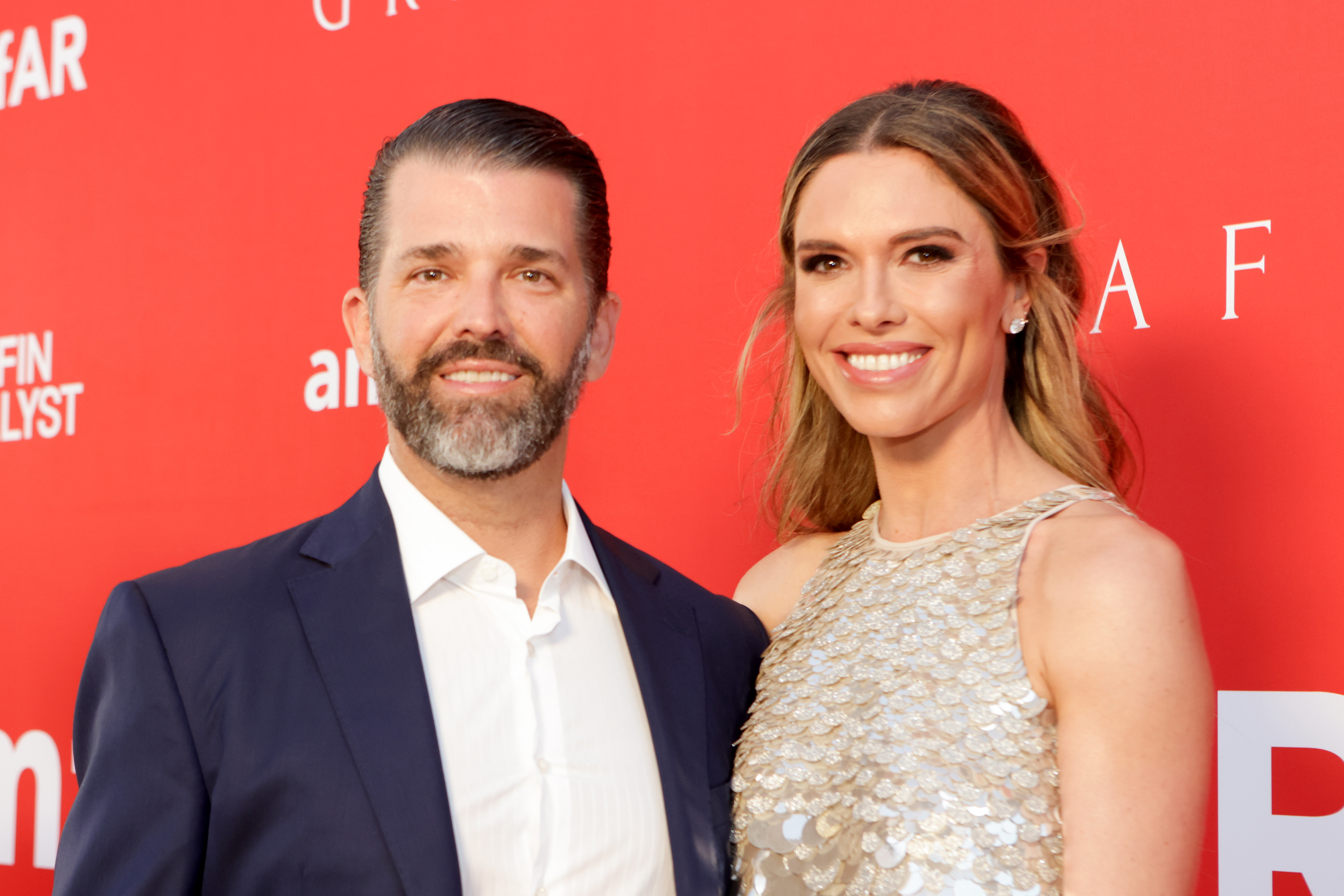 Donald Trump Jr. and Bettina Anderson attend amfAR Palm Beach Gala on March 15, 2025 in Palm Beach, Florida. | Source: Getty Images