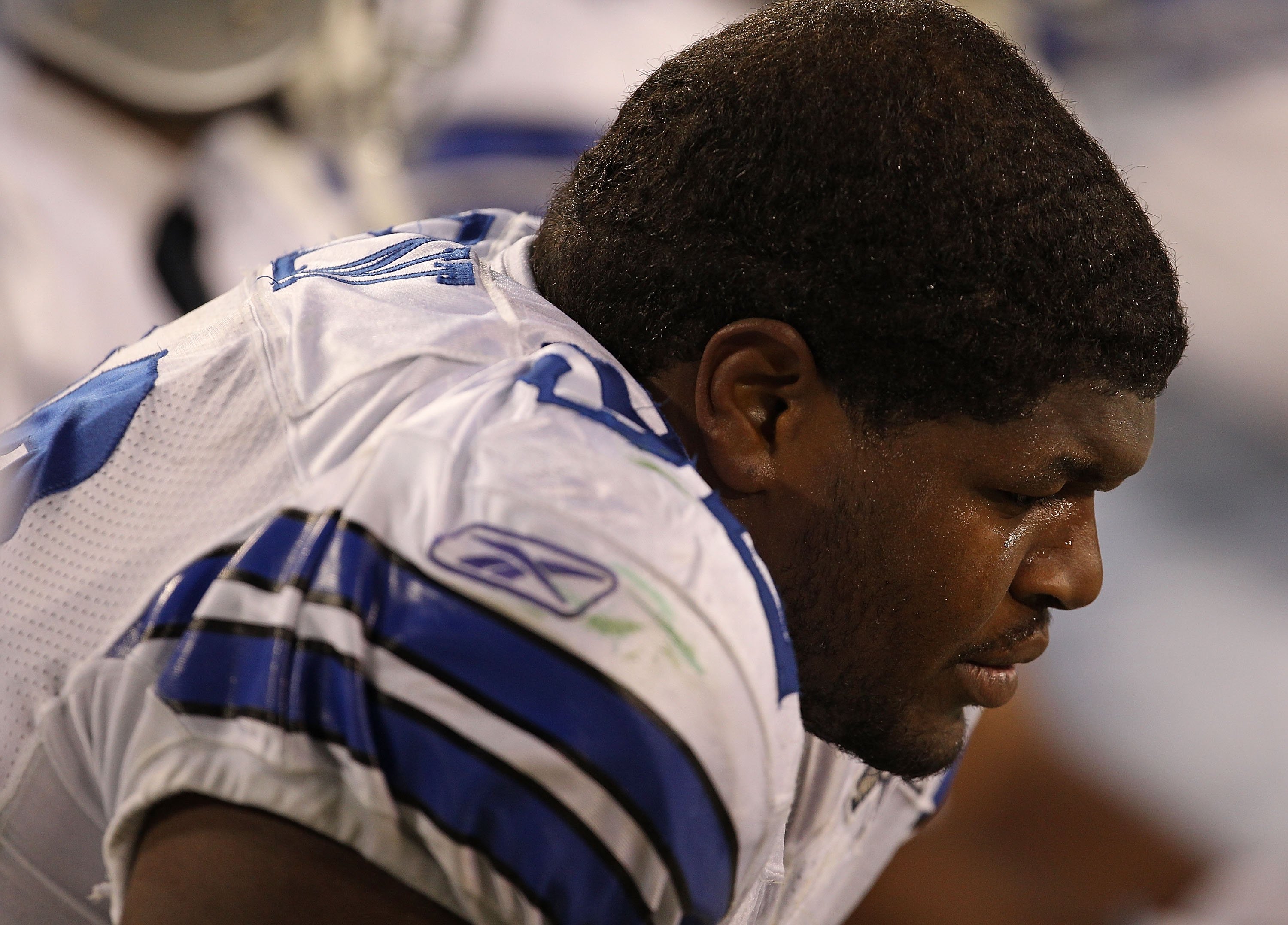 Josh Brent of the Dallas Cowboys sits on the bench during a game against the Green Bay Packers at Lambeau Field on November 7, 2010 | Photo: Getty Images