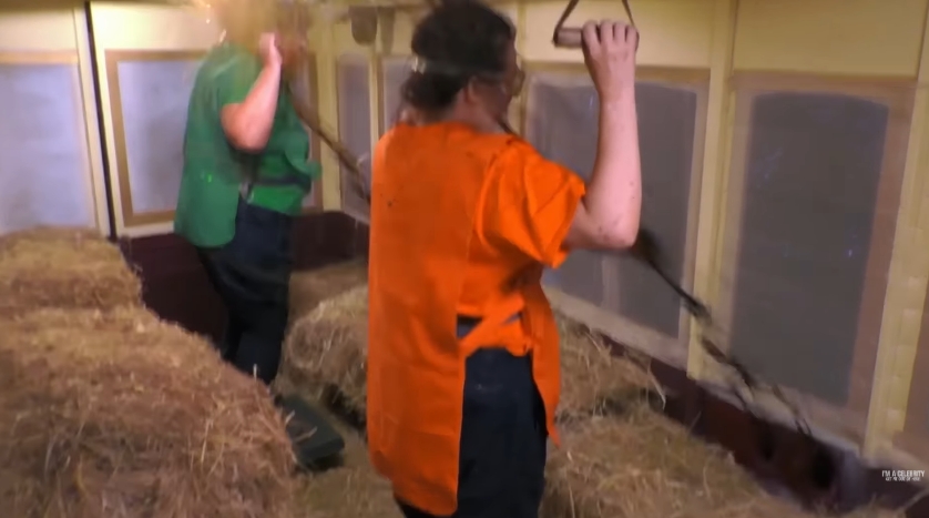 Scarlett Moffatt steadies herself while Gemma Collins struggles to hold firm, as the intense first round tests their endurance inside the enclosed train carriage. | Source: YouTube/ I'm A Celebrity... Get Me Out Of Here!