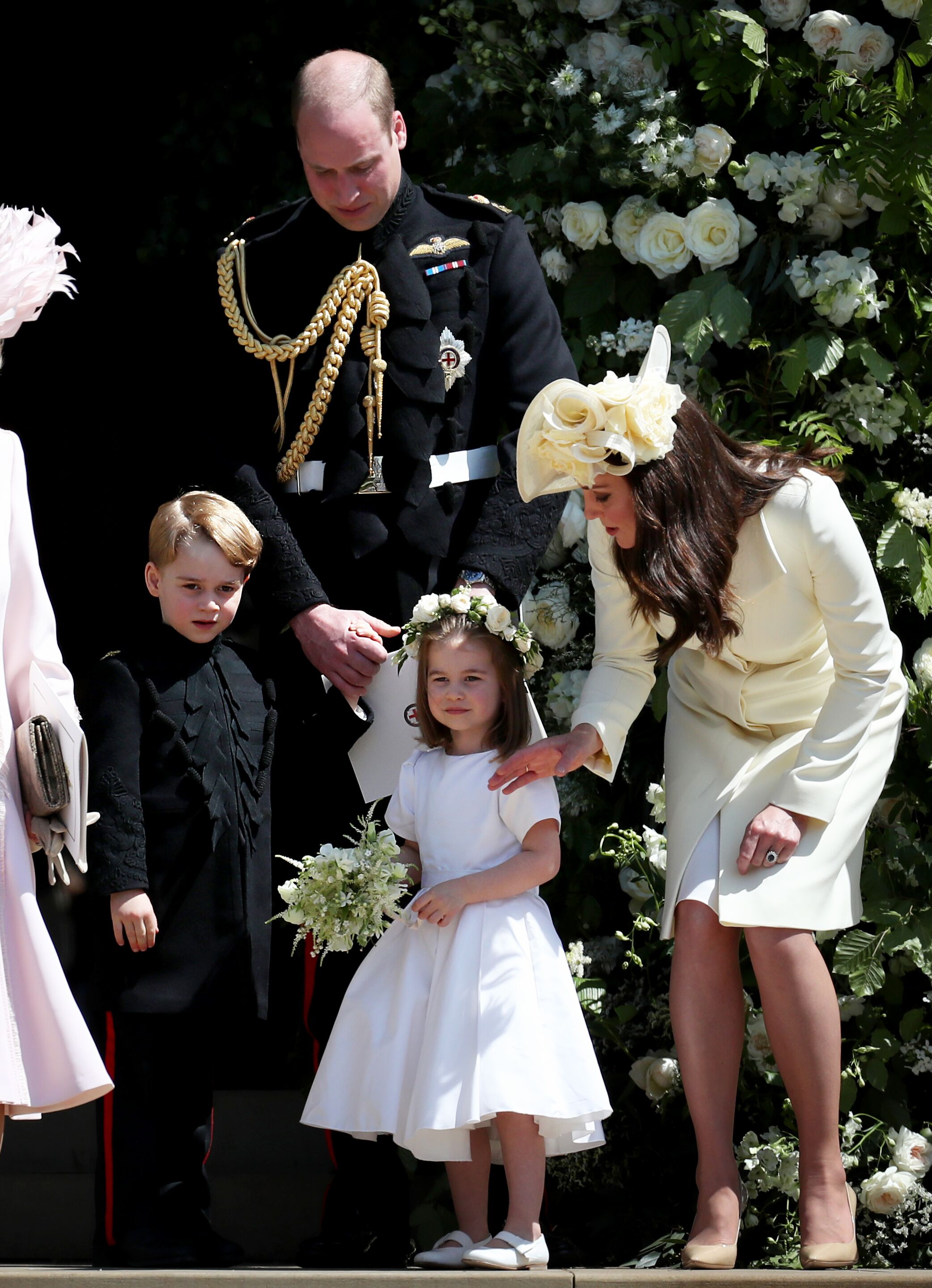 Prince William, Kate Middleton, Prince George and Princess Charlotte after the wedding of Prince Harry and Ms. Meghan Markle at St George's Chapel at Windsor Castle on May 19, 2018 in Windsor, England | Photo: Getty Images