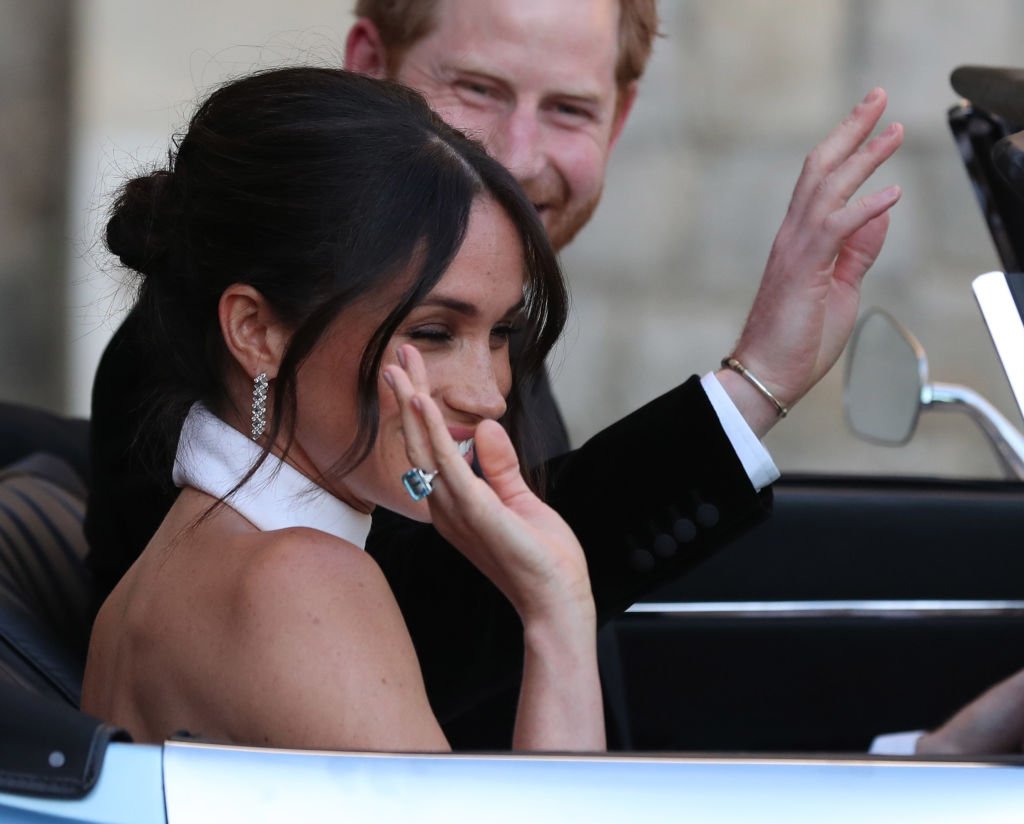 Meghan Markle and Prince Harry on their way to their wedding reception | Getty Images