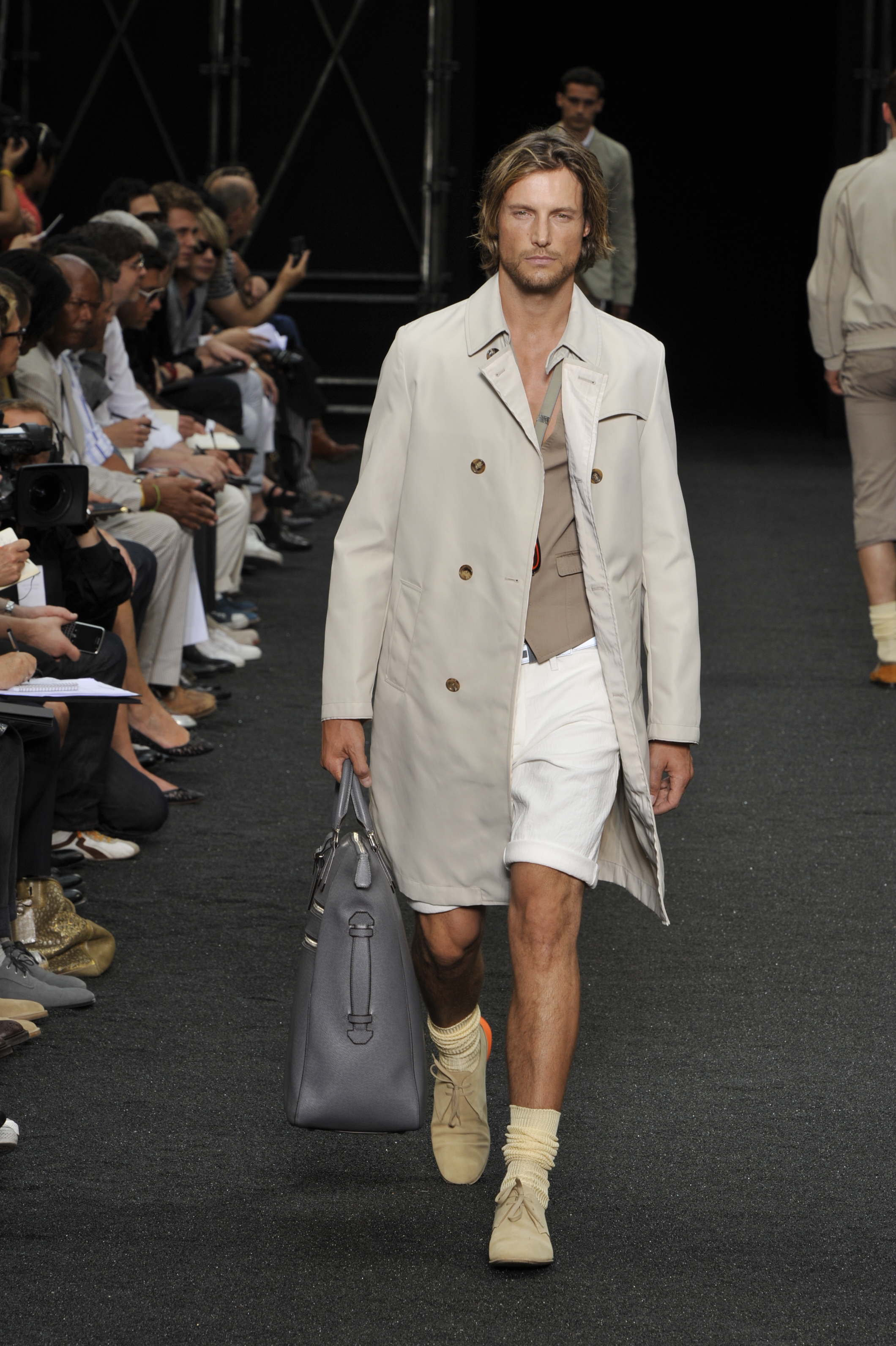 Gabriel Aubry walks the runway at Louis Vuitton's Spring 2010 menswear show in Paris on June 25, 2008 | Source: Getty Images