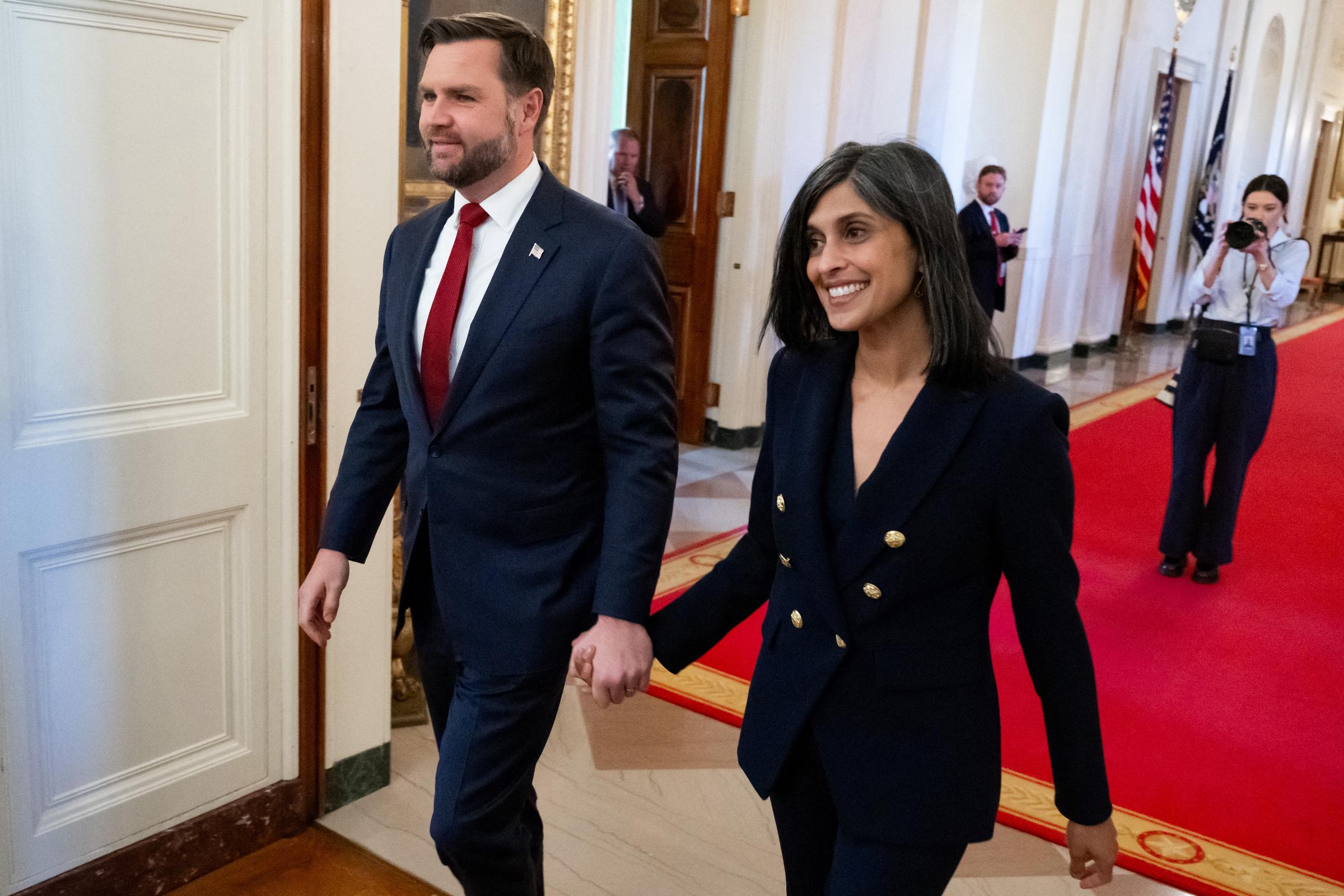 US Vice President JD Vance and Second Lady Usha Vance arrive for President Donald Trump to sign an executive order on foster children and families in the East Room of the White House on November 13, 2025, in Washington, DC | Source: Getty Images