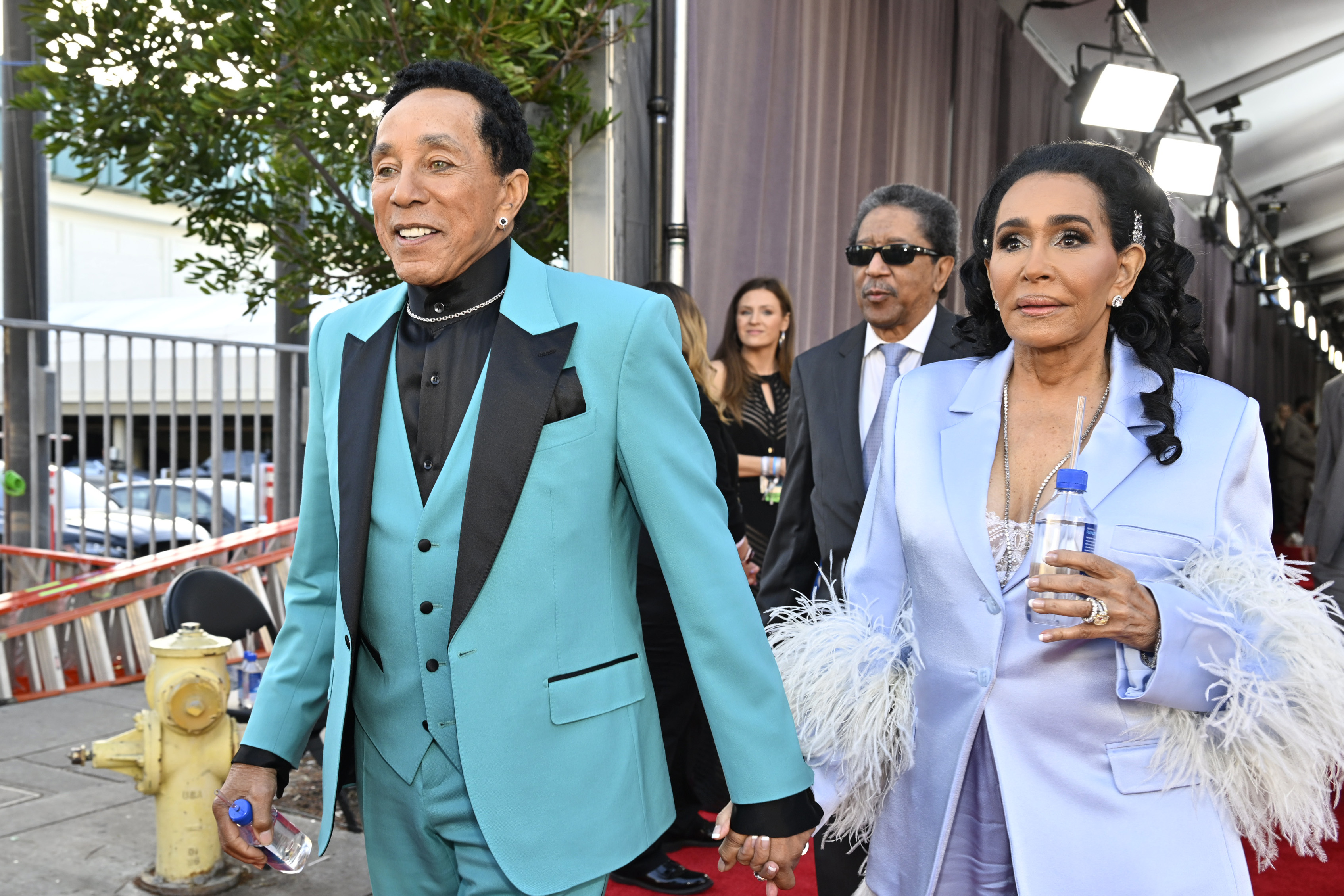 Smokey Robinson and Frances Glandney attend the 65th GRAMMY Awards with FIJI Water at the 65th GRAMMY Awards on, February 5, 2023, in Los Angeles, California. | Source: Getty Images