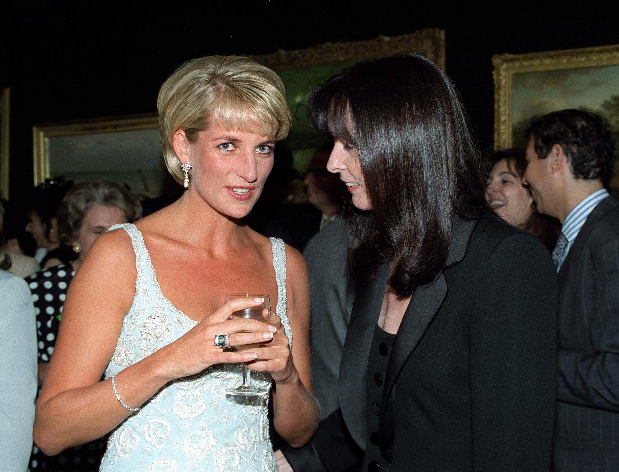 Princess Diana and her dress designer friend Catherine Walker at a private viewing and reception on June 2, 1997 | Source: Getty Images