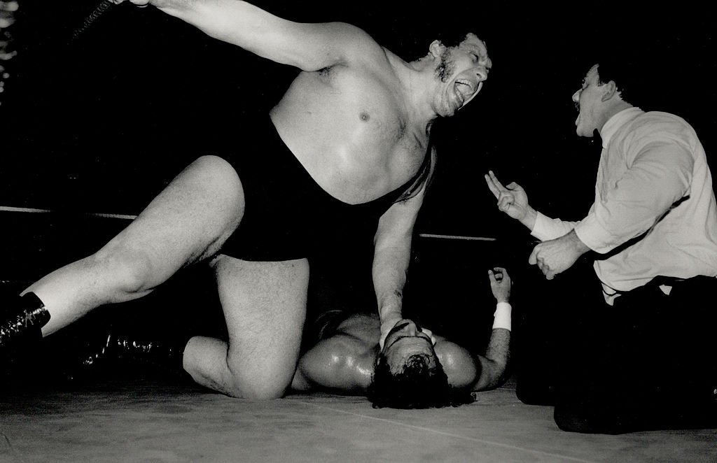 Andre The Giant spews vitriol at the referee as fans put in their two cents' worth on February 27, 1989. | Photo: Getty Images