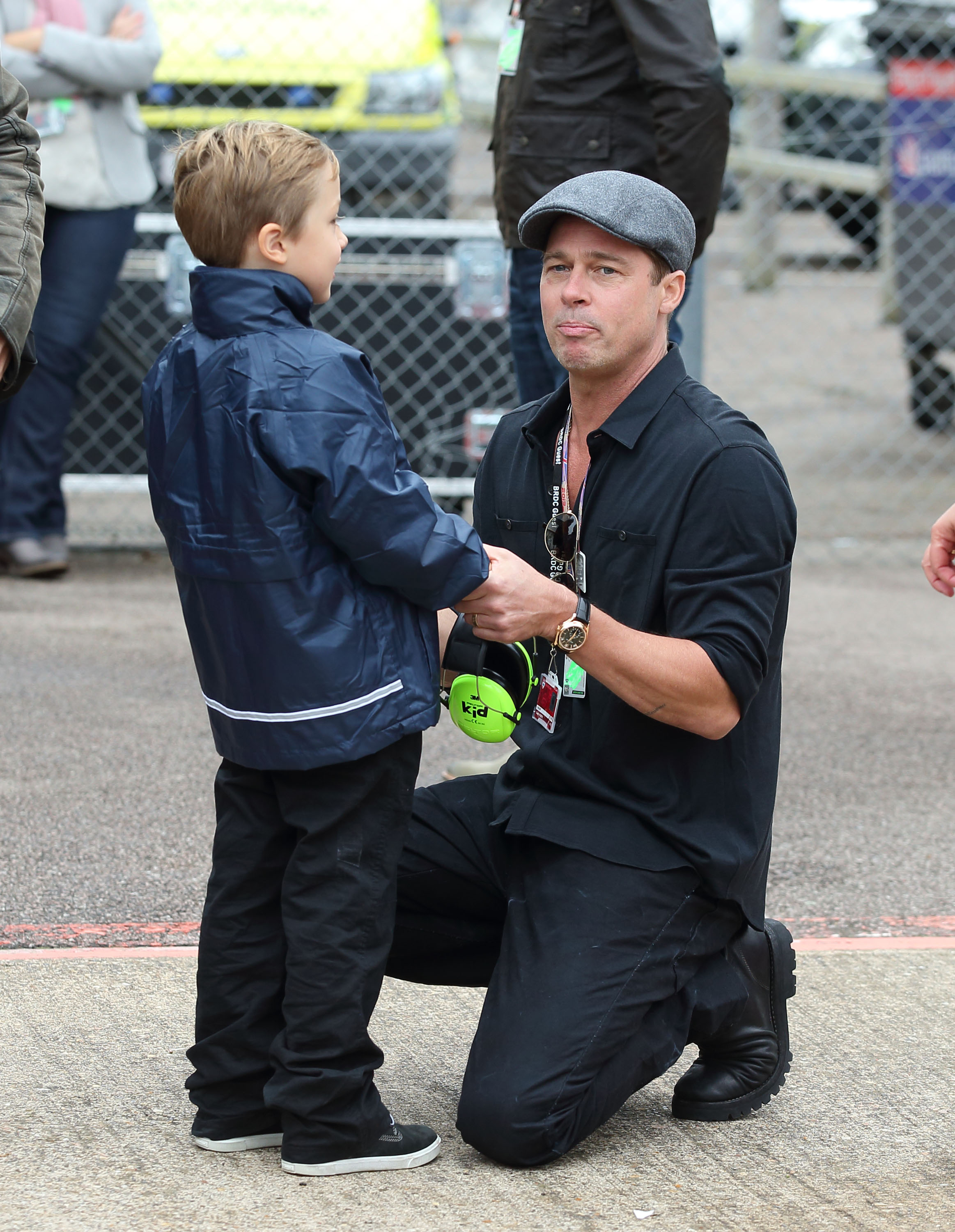 Brad Pitt and his son Knox Jolie-Pitt at the MotoGP British Grand Prix race on August 30, 2015, in Northampton, England | Source: Getty Images