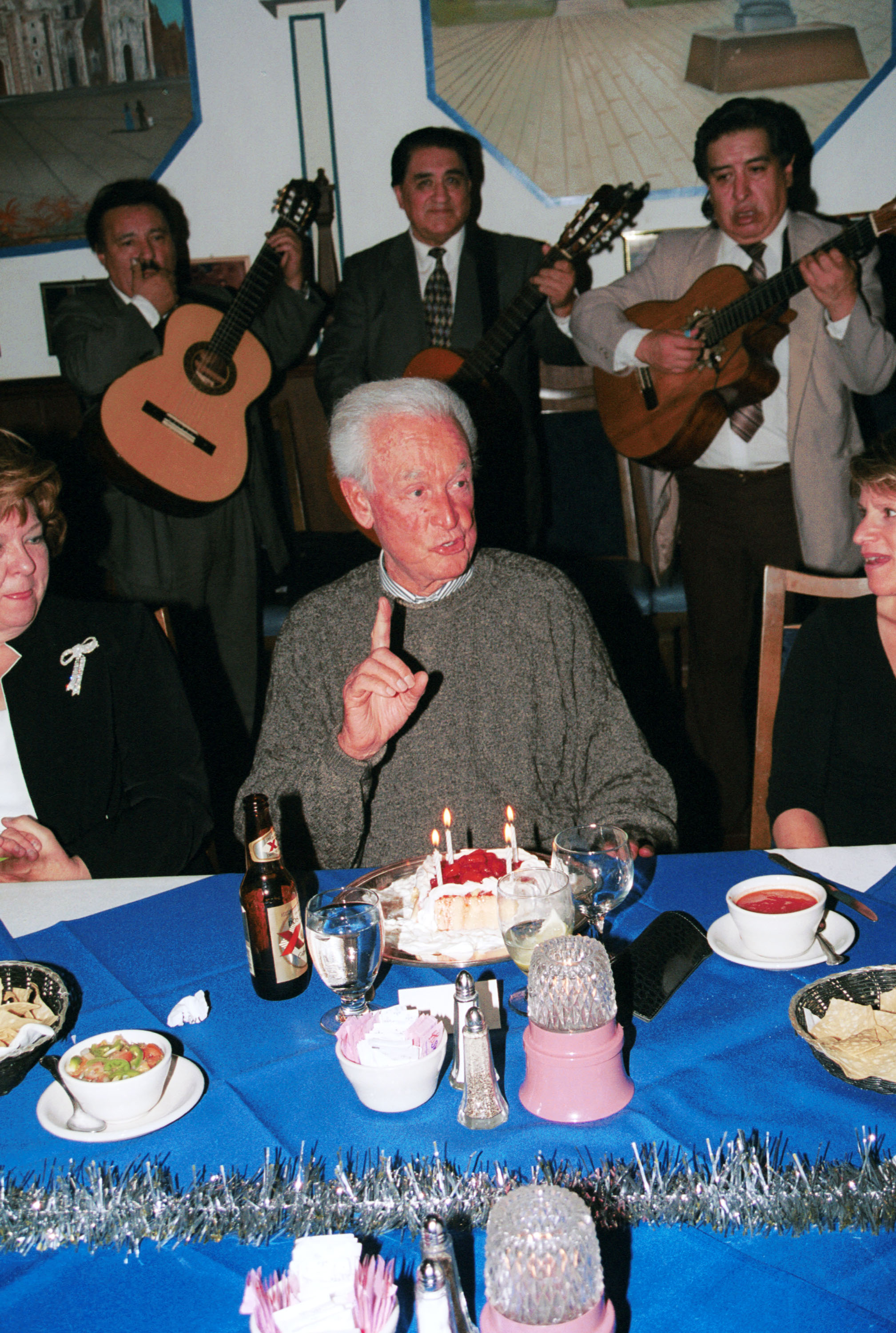 Game show host Bob Barker (C) blows out candles during his 79th birthday party at Antonios restaurant December 13, 2002 in West Hollywood, California. | Source: Getty Images
