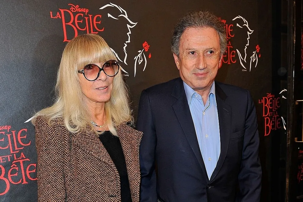Dany Saval et Michel Drucker assistent à la première de "La Belle et la Bête" au théâtre Mogador, le 20 mars 2014 à Paris, en France. | Photo : Getty Images