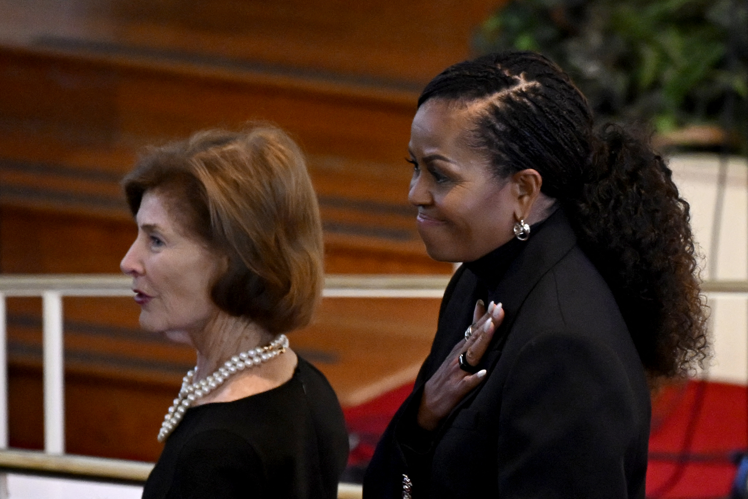 Former U.S. First Ladies Laura Bush and Michelle Obama at former U.S First Lady Rosalynn Carter's tribute service in Atlanta, Georgia on November 28, 2023 | Source: Getty Images