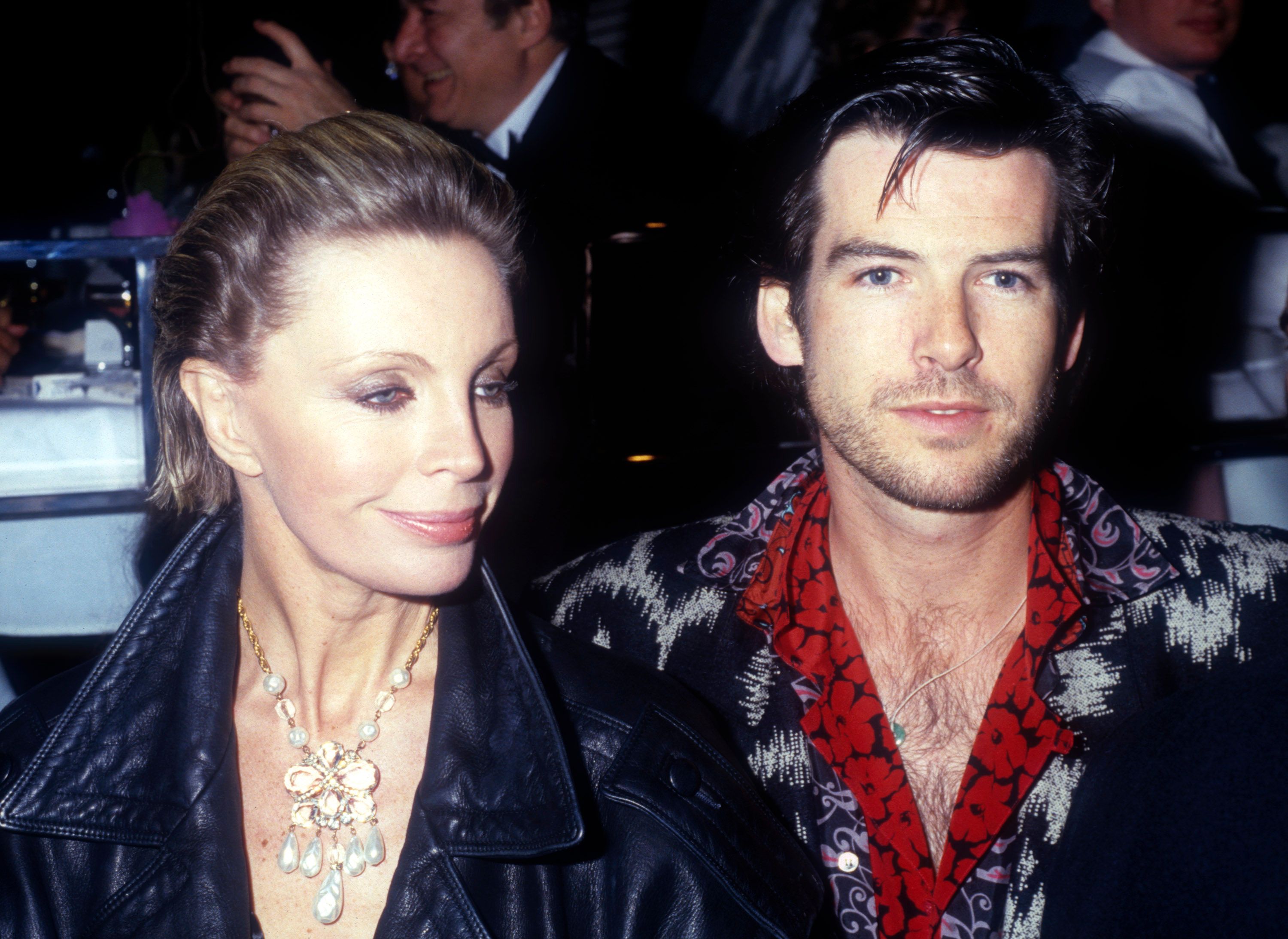 Pierce Brosnan and his now-late wife Cassandra Harris at the opening night party at Stringfellow's in 1986 in New York City | Source: Getty Images