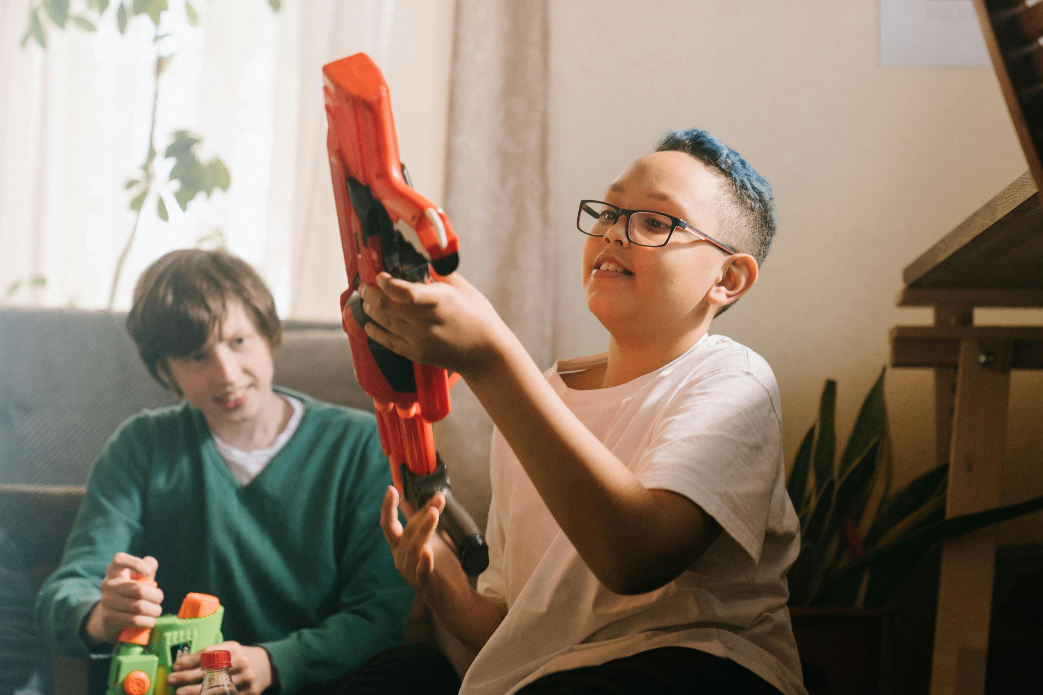 Boys with water guns | Source: Pexels