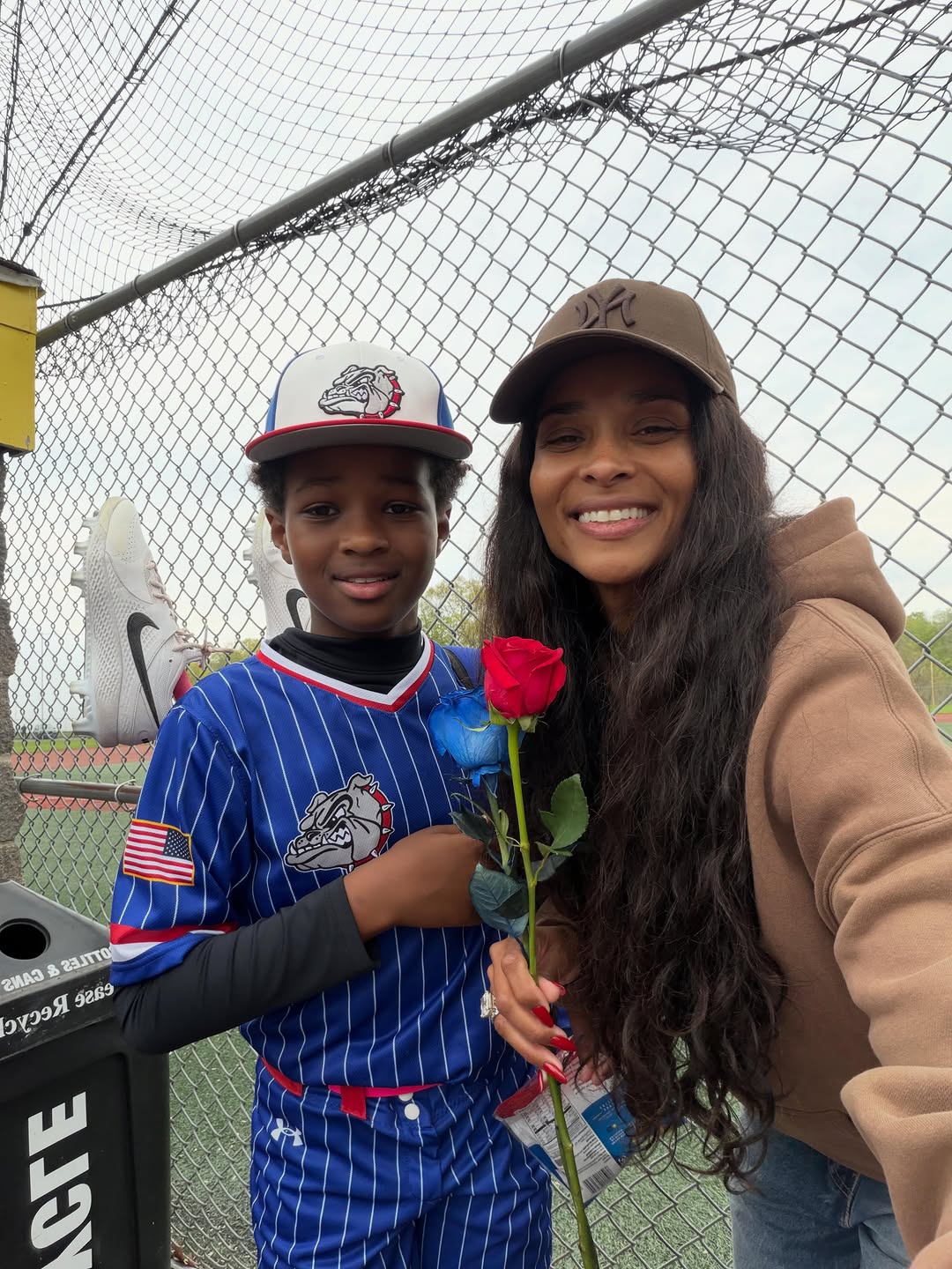 Ciara smiling with Future Wilburn at a baseball field. | Source: Instagram/ciara