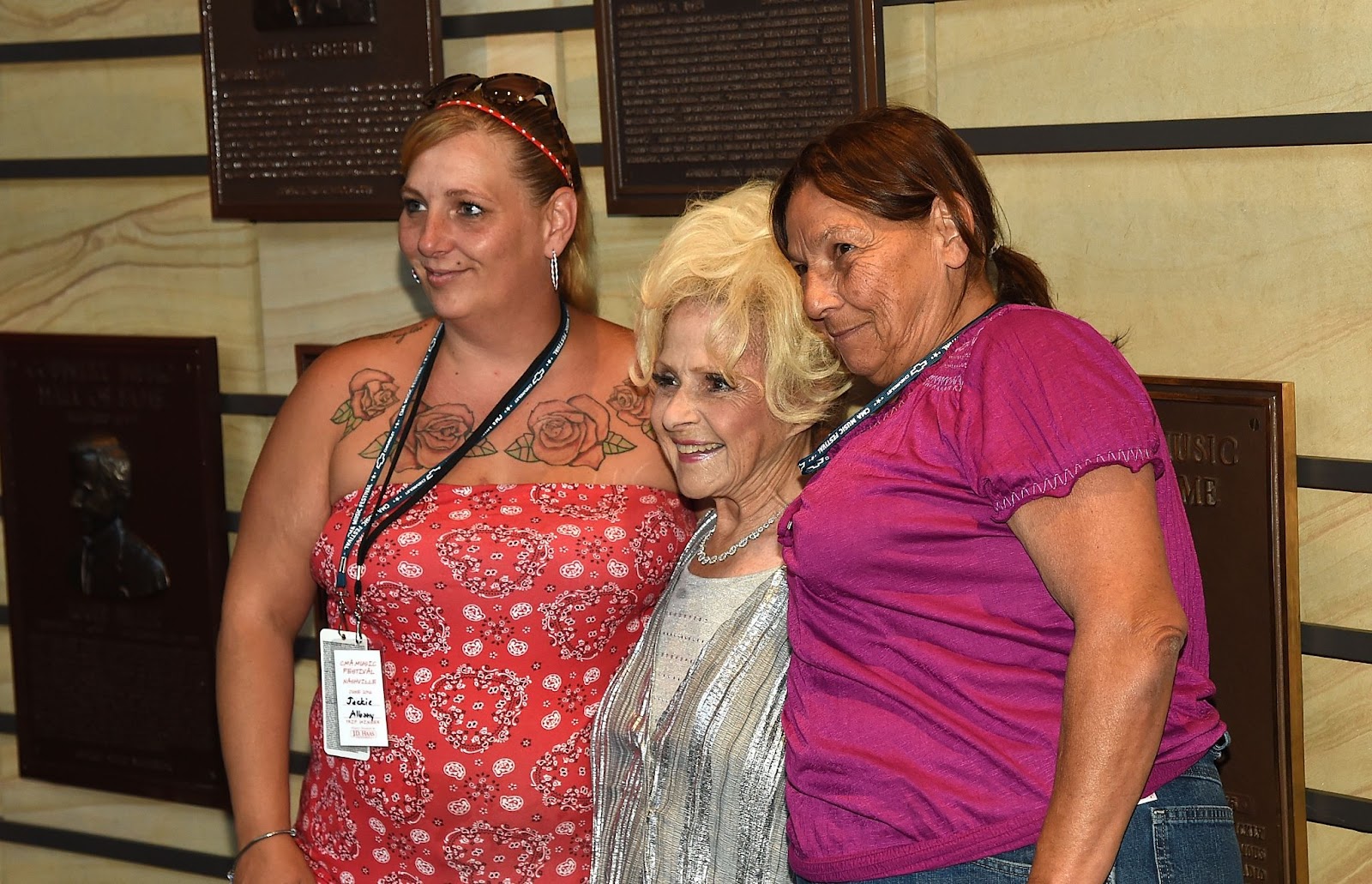 Brenda Lee taking photos with fans at an autograph signing during the 2016 CMA Music Festival on June 11, 2016, in Nashville, Tennessee. | Source: Getty Images