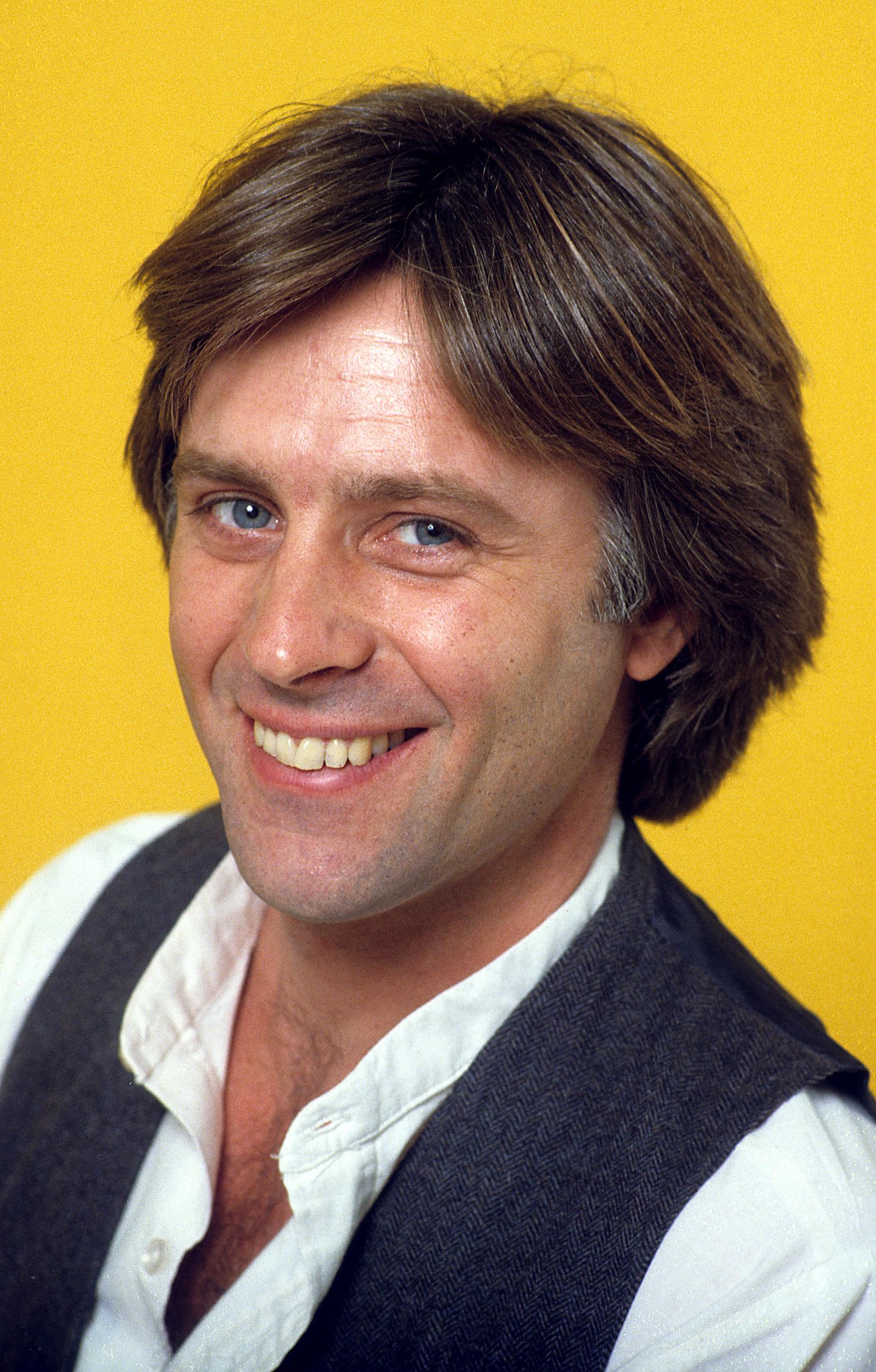 Joel Higgins posing for a portrait, circa 1982. | Source: Getty Images