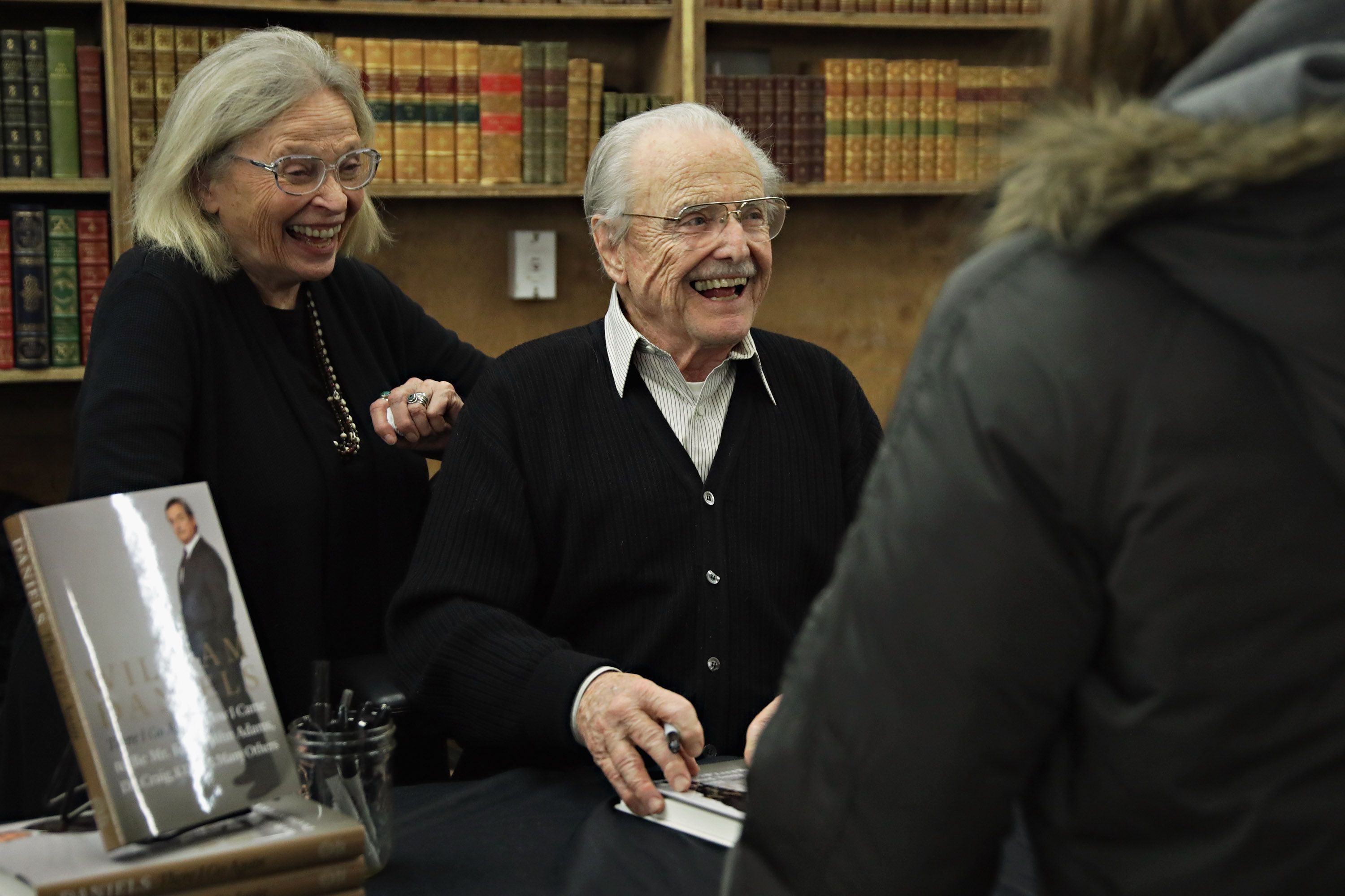Bonnie Bartlett and William Daniels meet fans as he signs copies of "There I Go Again: How I Came To Be Mr. Feeny, John Adams, Dr. Craig, KITT and Many Others" on March 2, 2017, in New York City | Photo: Cindy Ord/Getty Images