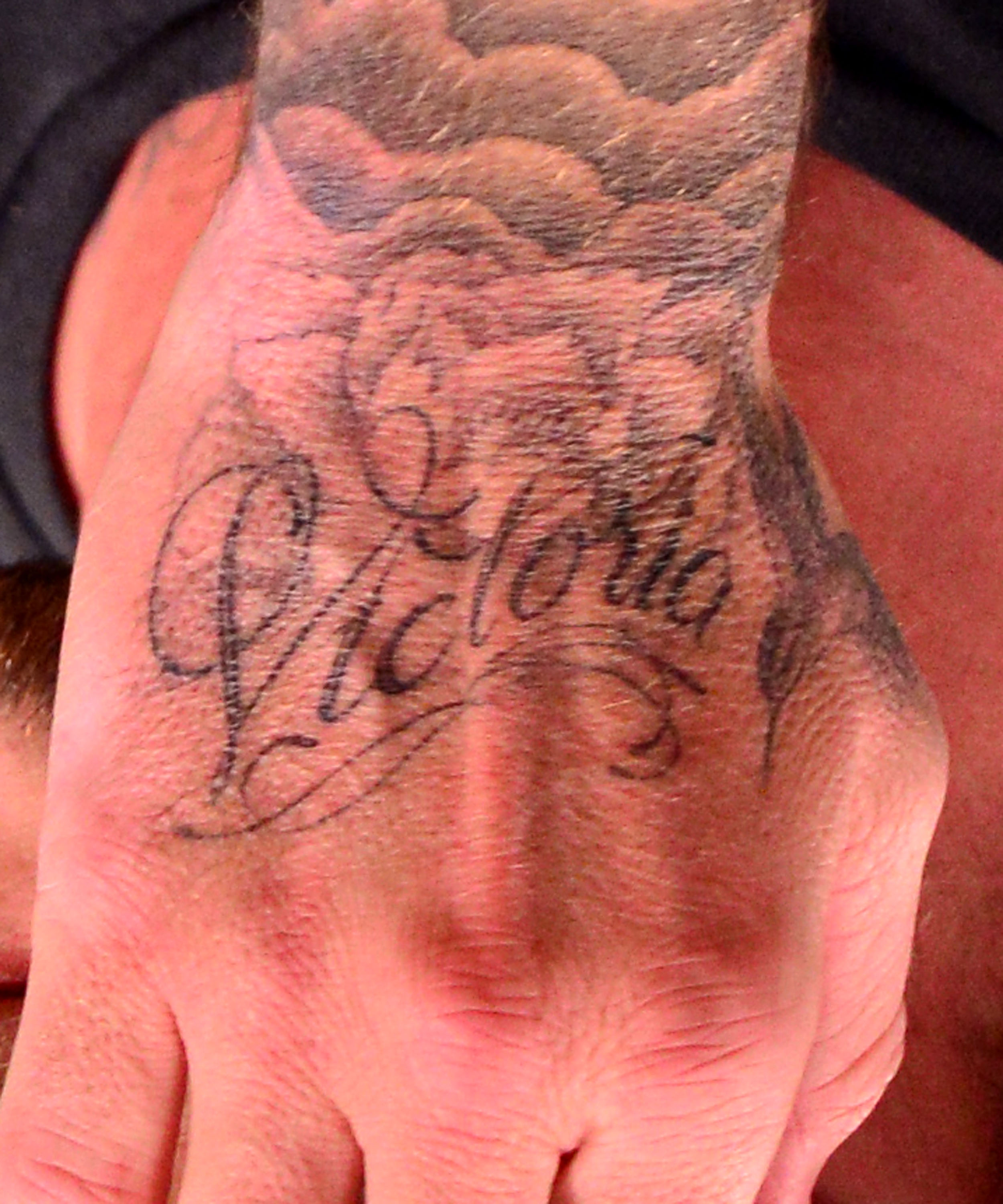 David Beckham's tattoo of Victoria Beckham's name seen on November 1, 2013 in New York City | Source: Getty Images