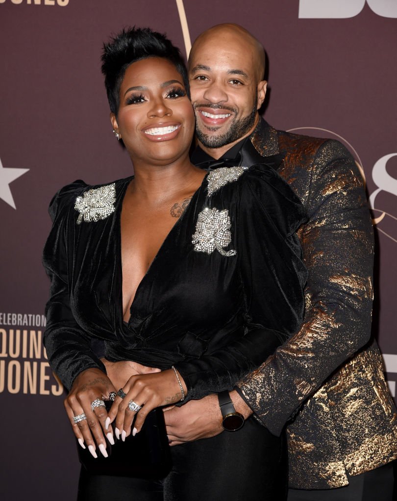 Fantasia Barrino and her husband Kendall Taylor share an embrace as they arrived at the "Q85: A Musical Celebration for Quincy Jones" on September 25, 2018, in Los Angeles, California | Source: Kevin Winter/Getty Images