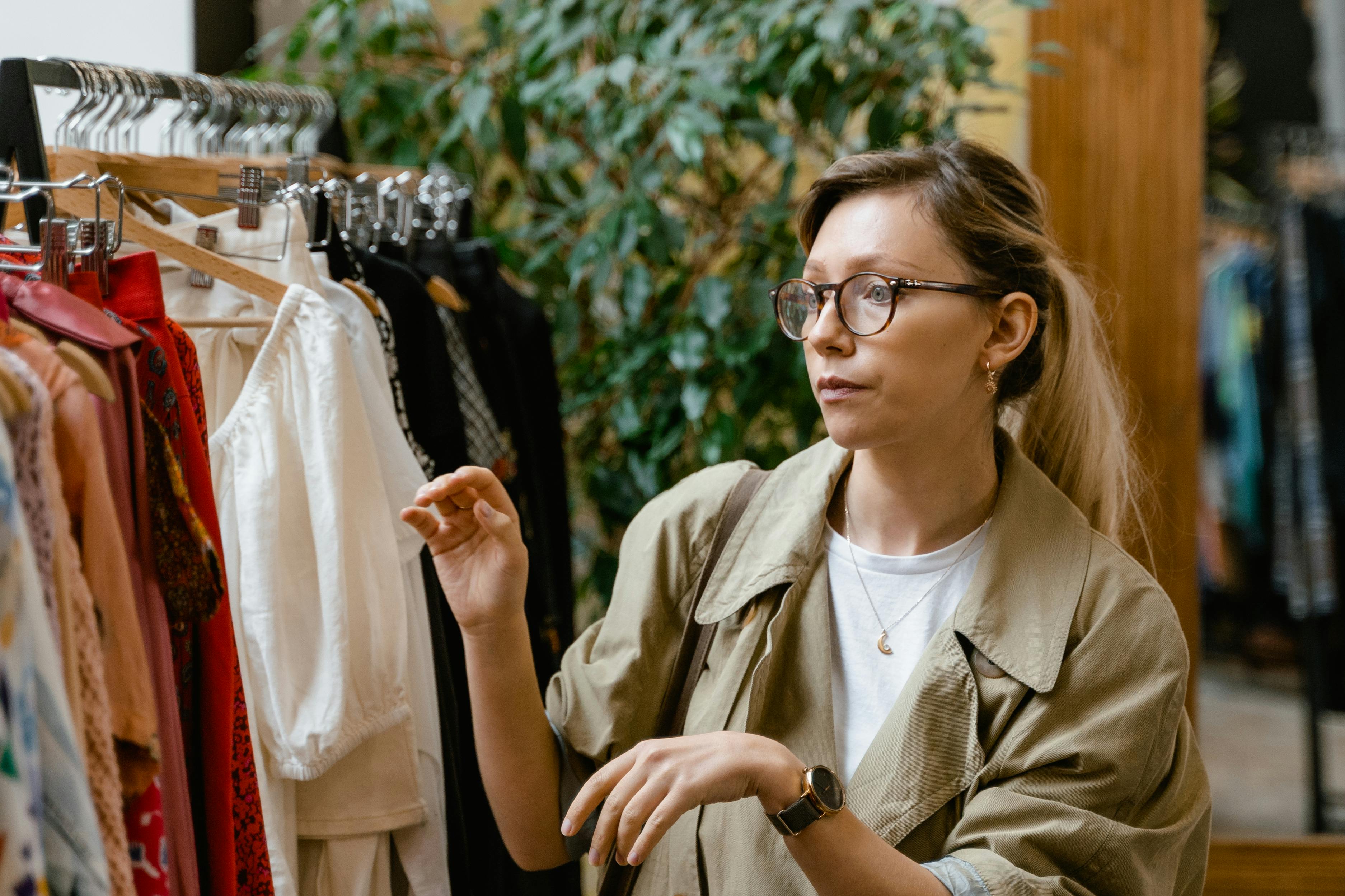 A woman choosing items at a store | Source: Pexels