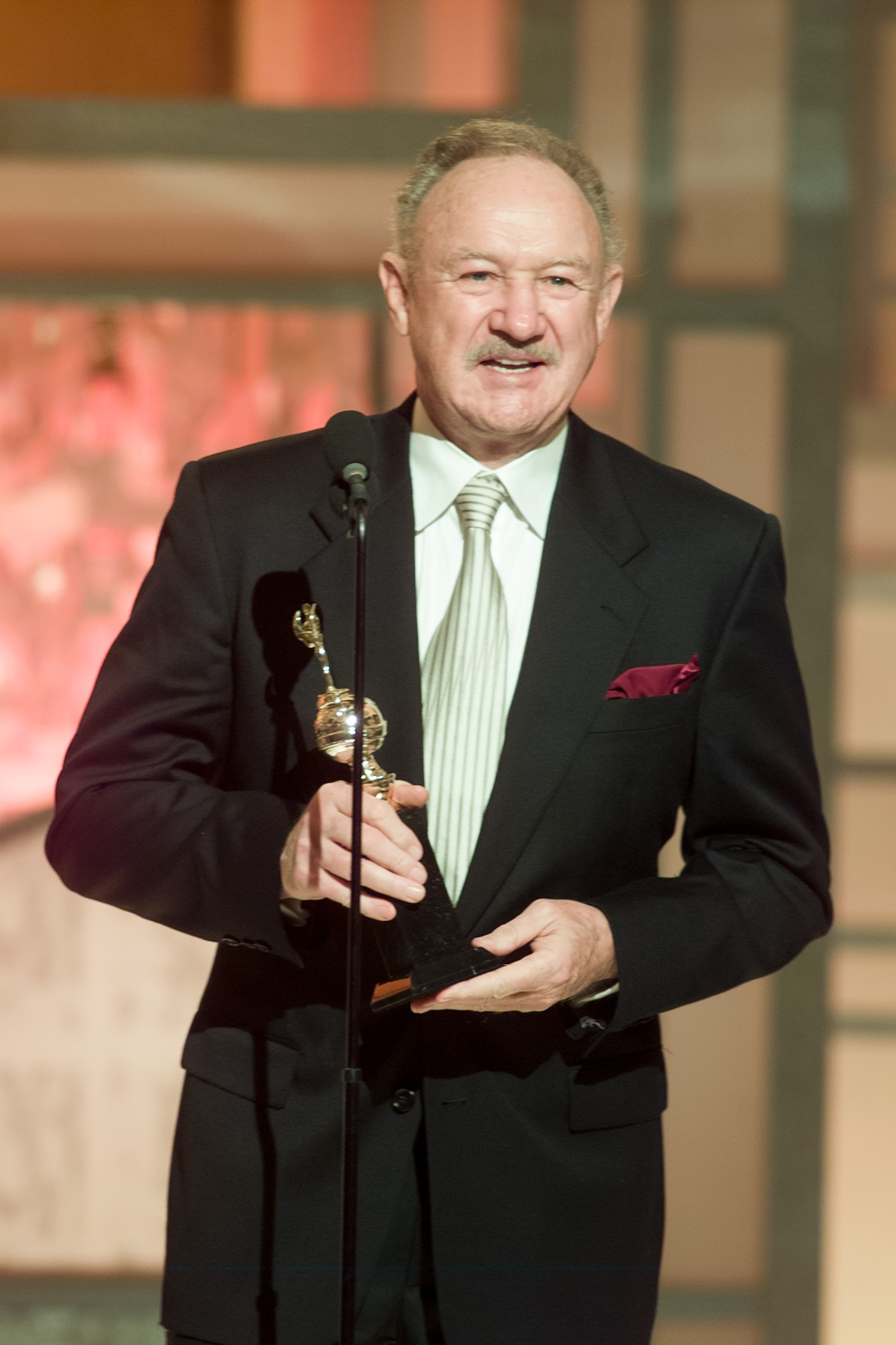 Actor Gene Hackman accepts the Cecil B. DeMille award on stage at the 60th Annual Golden Globe Awards held at the Beverly Hilton Hotel on January 19, 2003. | Source: Getty Images