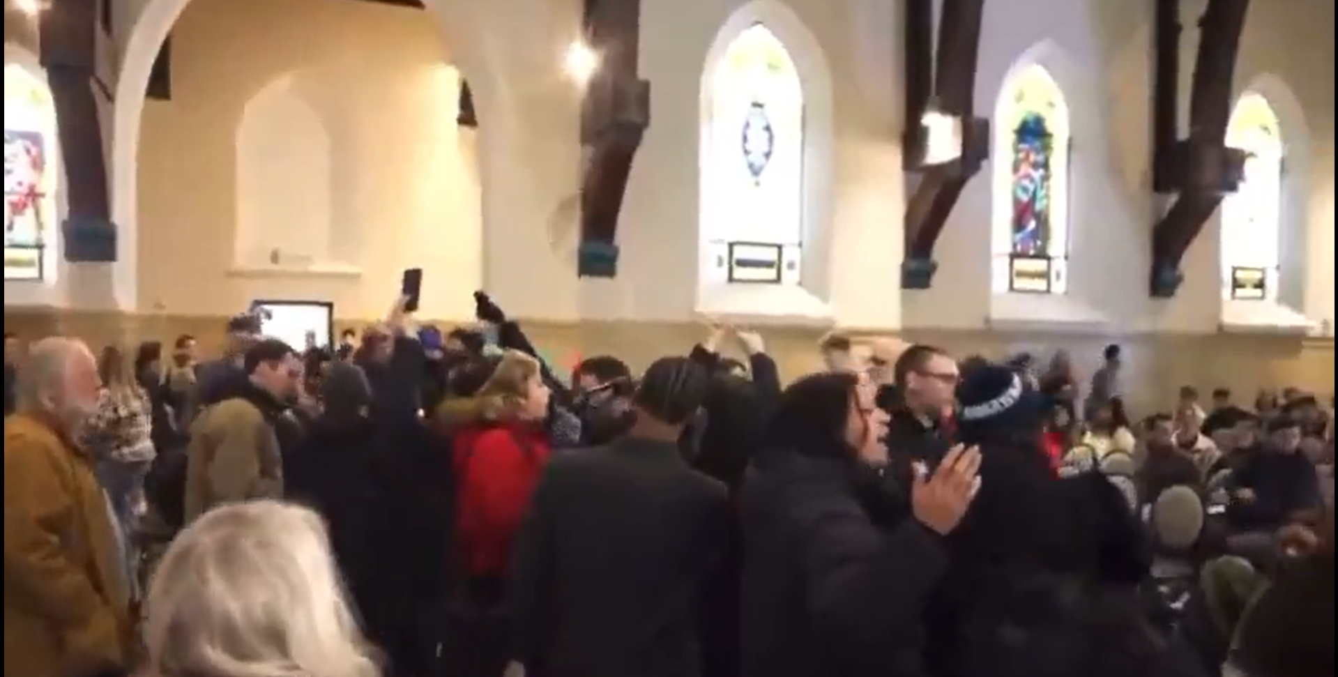 Protestors in a church, as seen in a video posted on January 19, 2026 | Source: X/@CultureWar2020