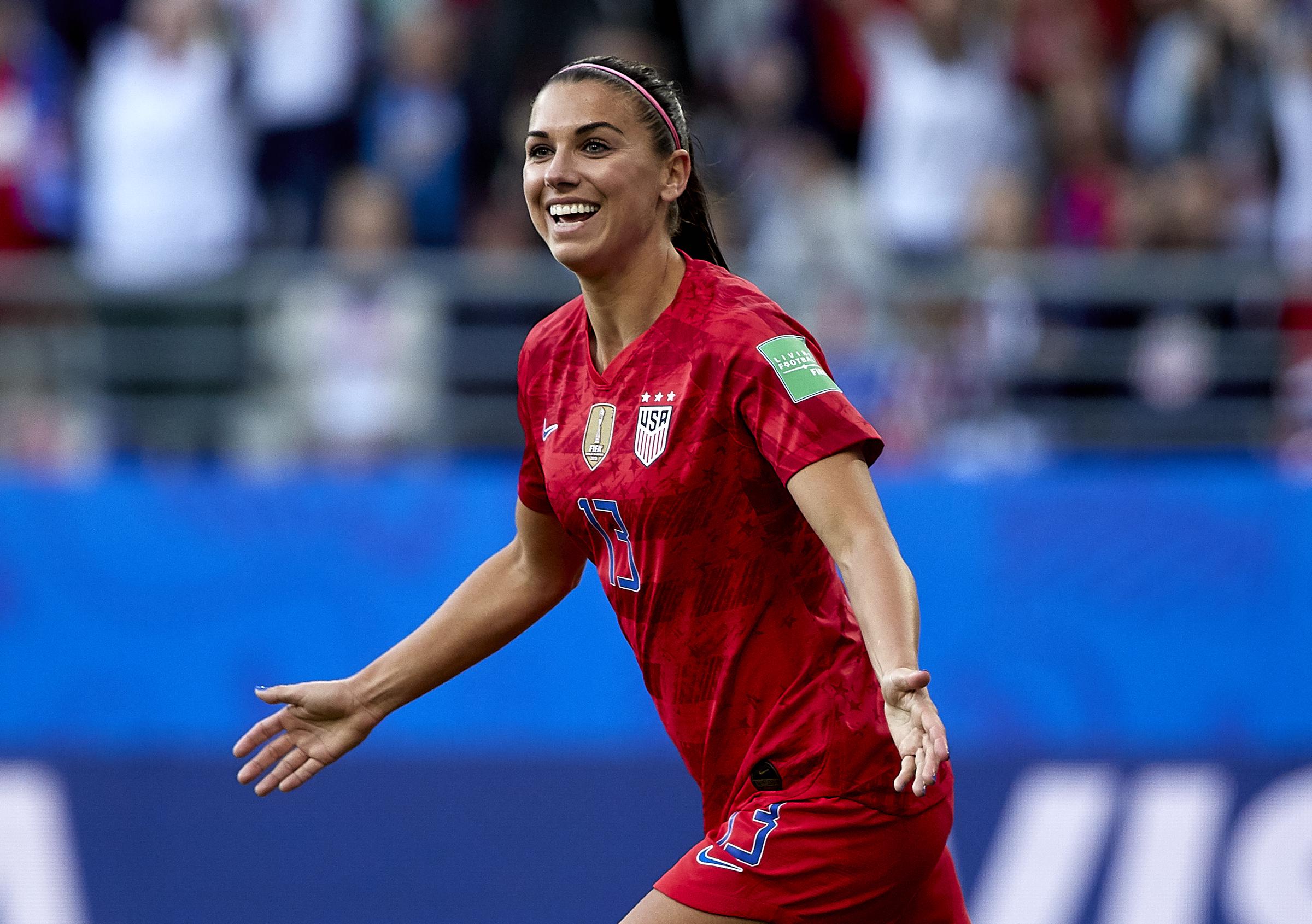 Alex Morgan celebrates their team's first goal during the 2019 FIFA Women's World Cup France group F match between USA and Thailand in Reims, France, on June 11, 2019. | Source: Getty Images