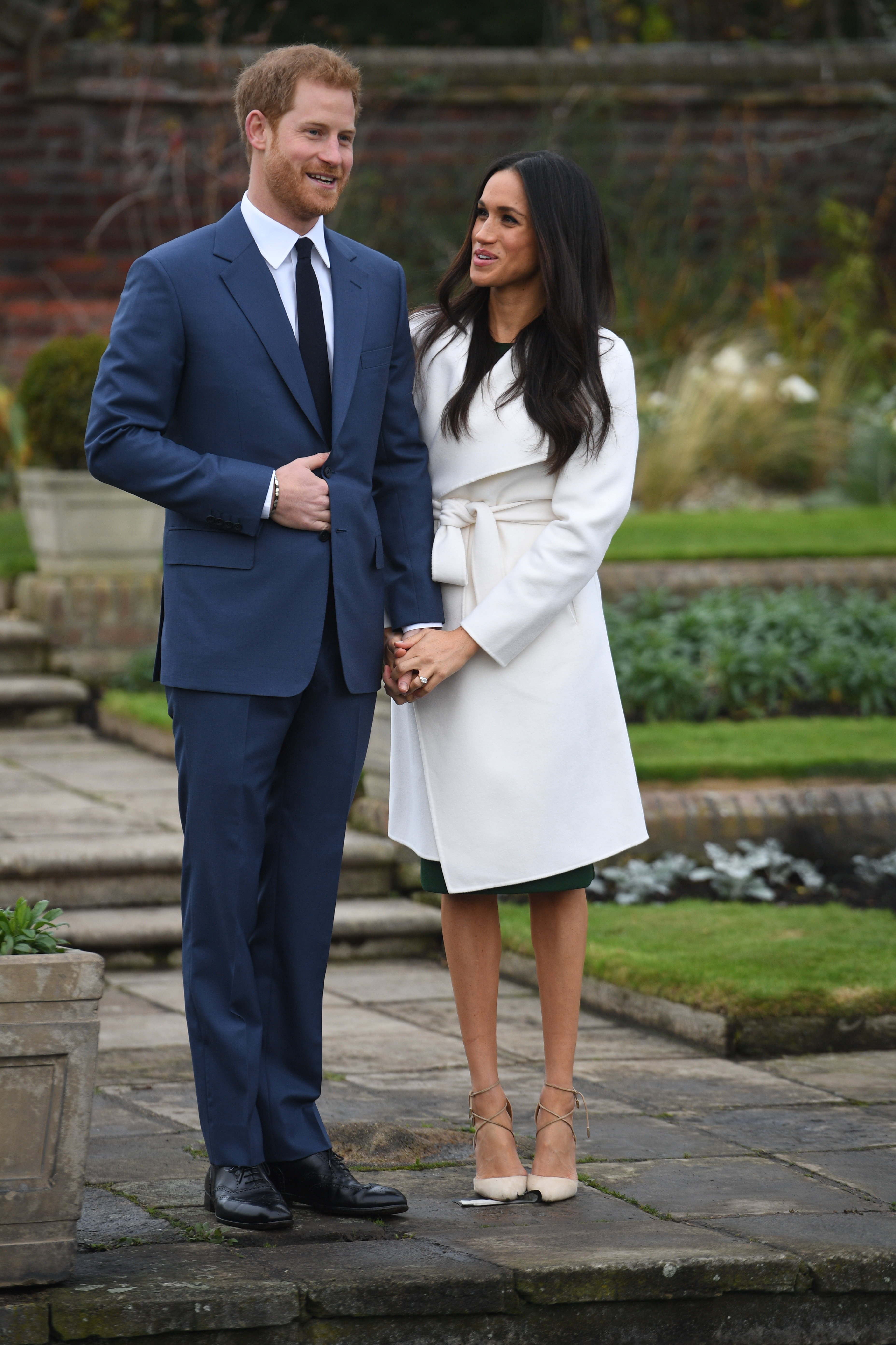 Prince Harry and Meghan Markle attend a photocall in the Sunken Gardens on November 27, 2017, in London, England. | Source: Getty Images