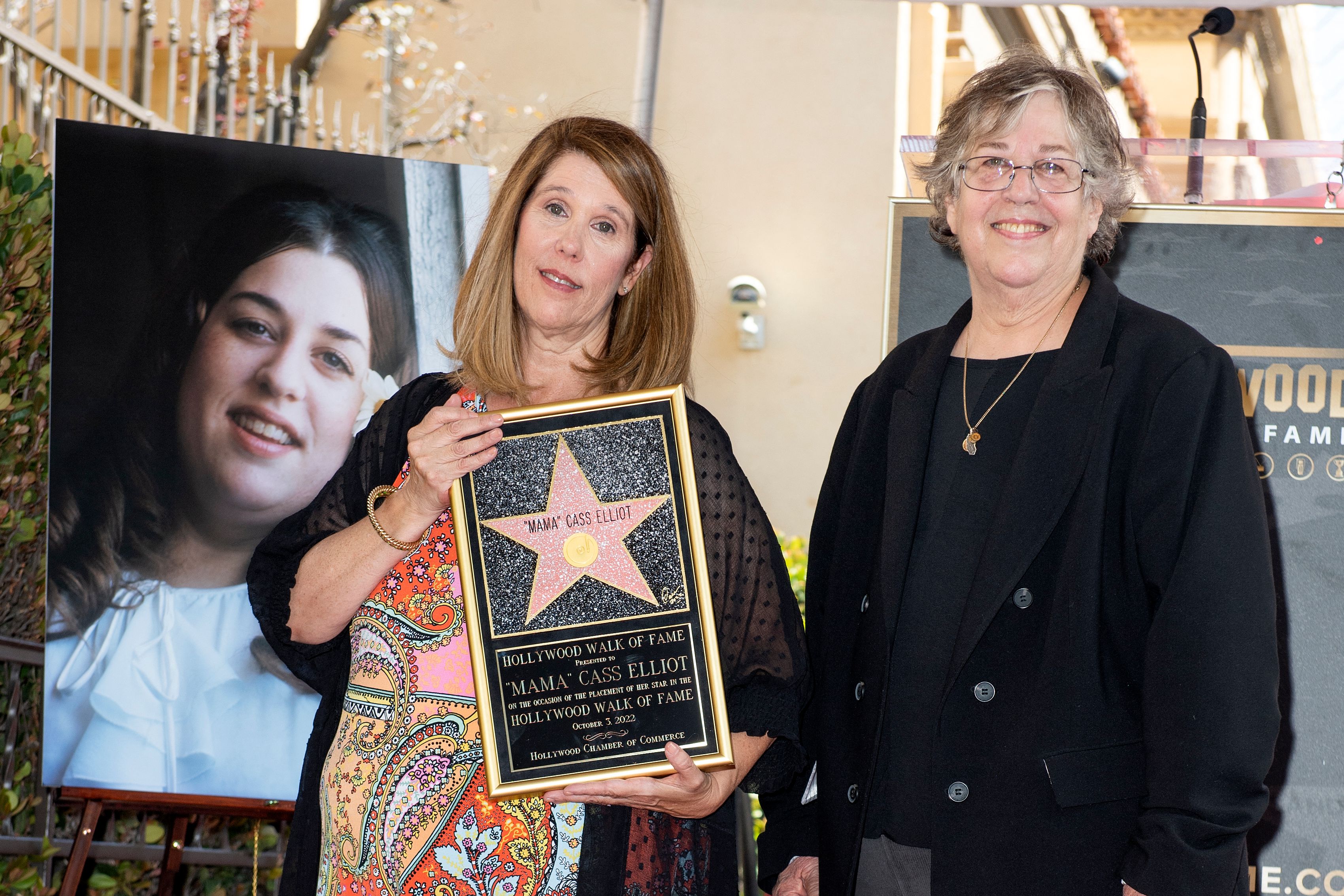 Owen Elliot-Kugell (L) and Leah Kunkel attend a ceremony for "Mama" Cass Elliott's posthumous star on the Hollywood Walk of Fame on October 3, 2022, in Hollywood, California. | Source: Getty Images