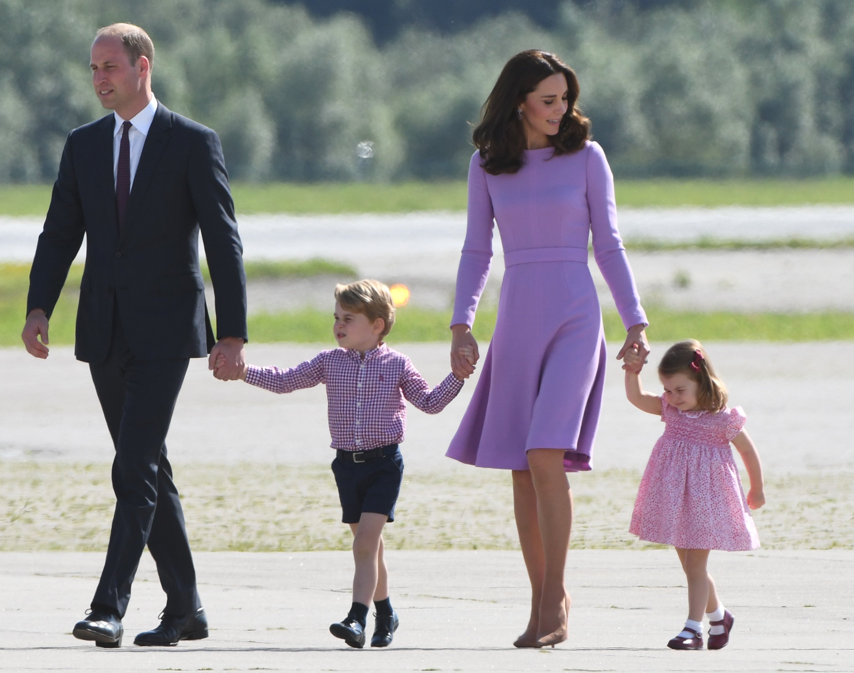 Prince William and his wife Kate Middleton and their children Prince George and Princess Charlotte in Hamburg, northern Germany, on July 21,2017 | Source: Getty Images