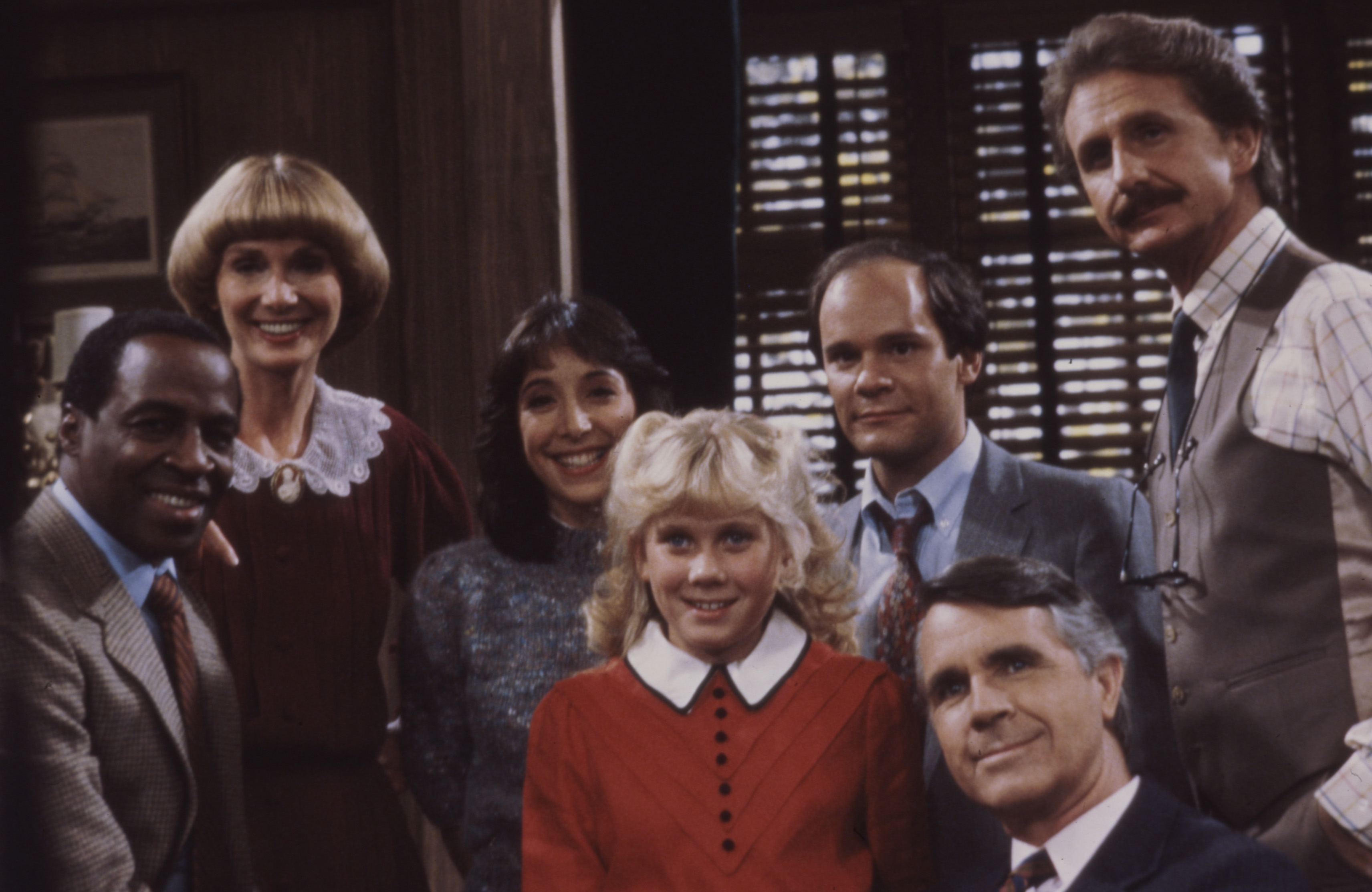 (L-R) Robert Guillaume, Inga Swenson, Didi Conn, Missy Gold, Ethan Phillips, James Noble and Rene Auberjonois pose for promotional photo for "Benson" on January 1, 1982 in Los Angeles, California | Source: Getty Images
