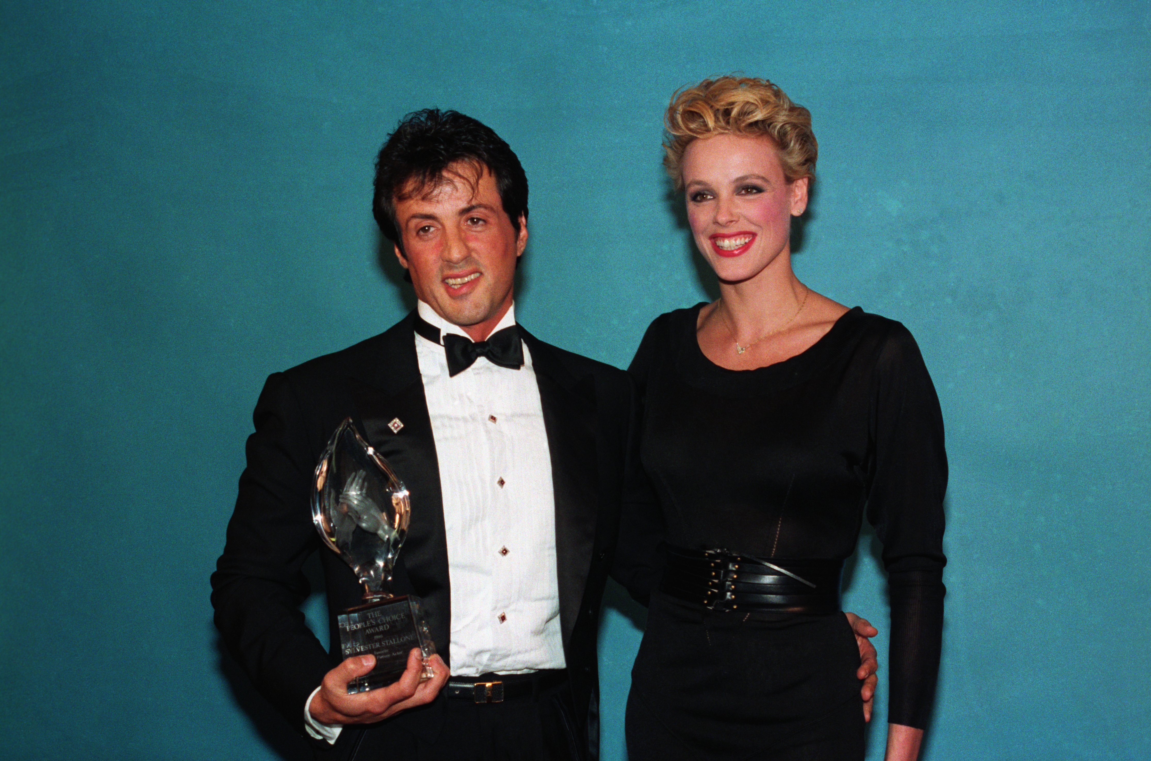 Sylvester Stallone and Brigitte Nielsen after he received his People's Choice award | Source: Getty Images