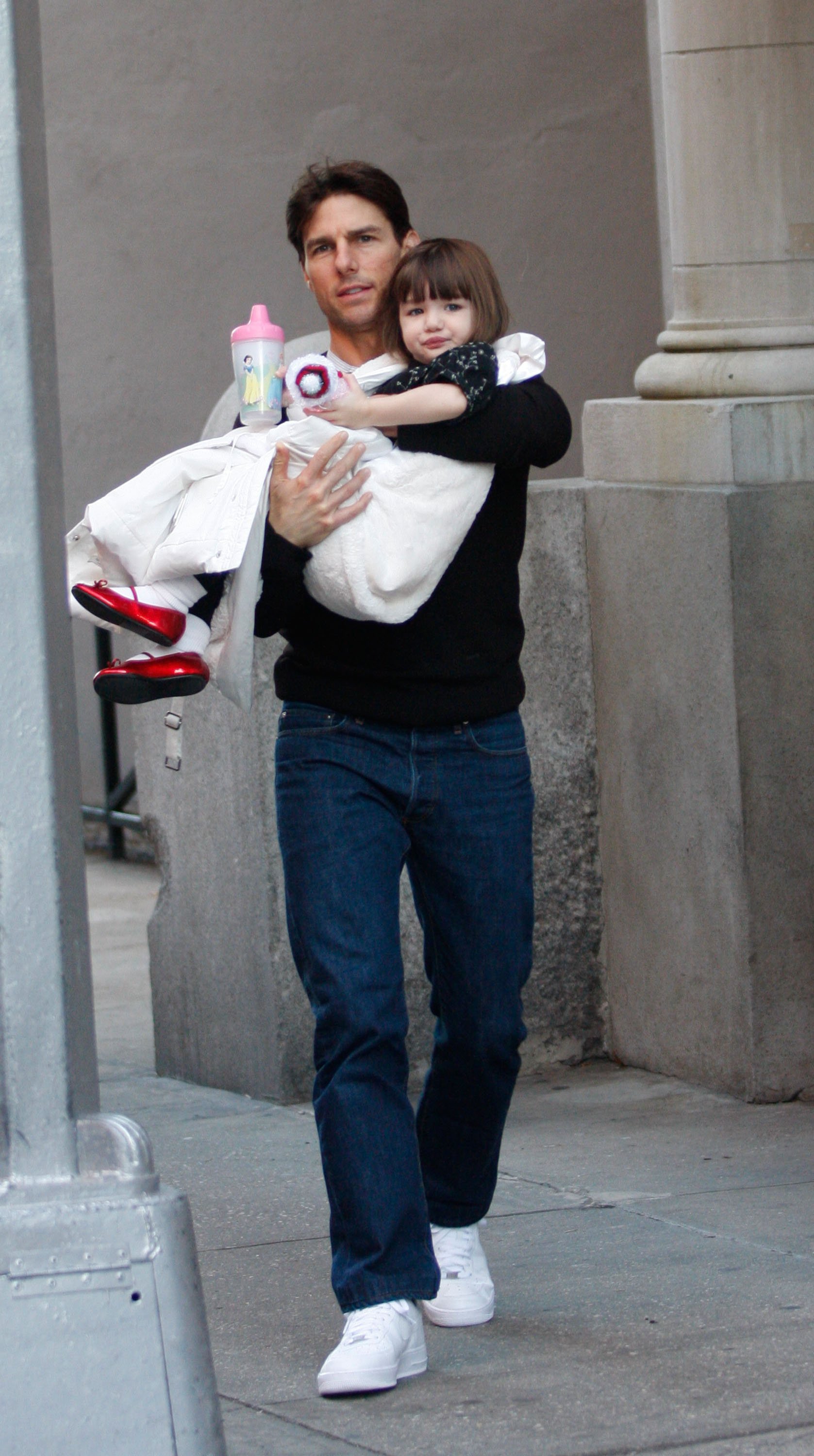 Tom Cruise and daughter Suri Cruise are seen on the streets of Manhattan on December 3, 2008 in New York City | Source: Getty Images