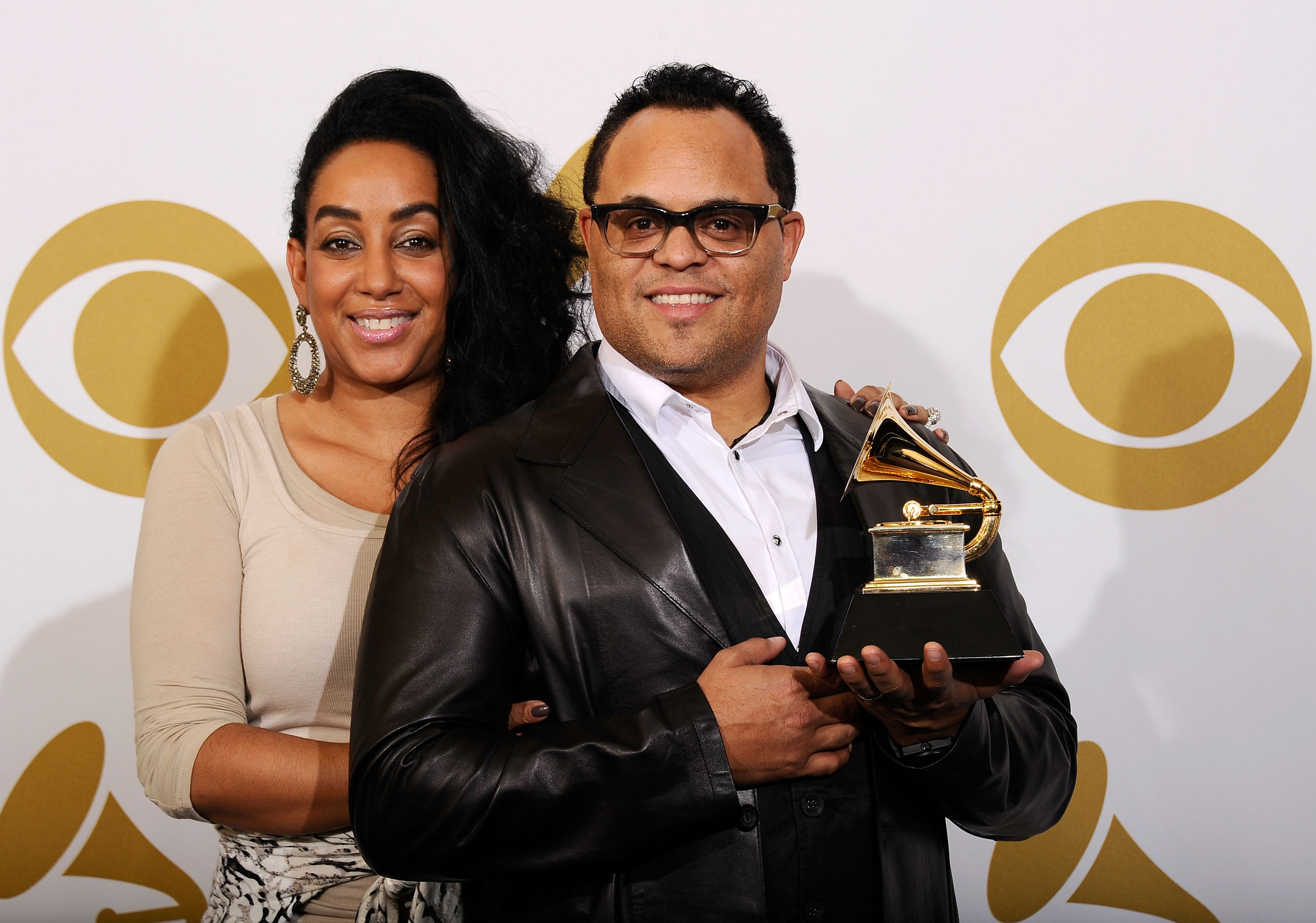 Meleasa and Israel Houghton pose in the press room at The 53rd Annual GRAMMY Awards held at Staples Center on February 13, 2011, in Los Angeles, California. | Source: Getty Images