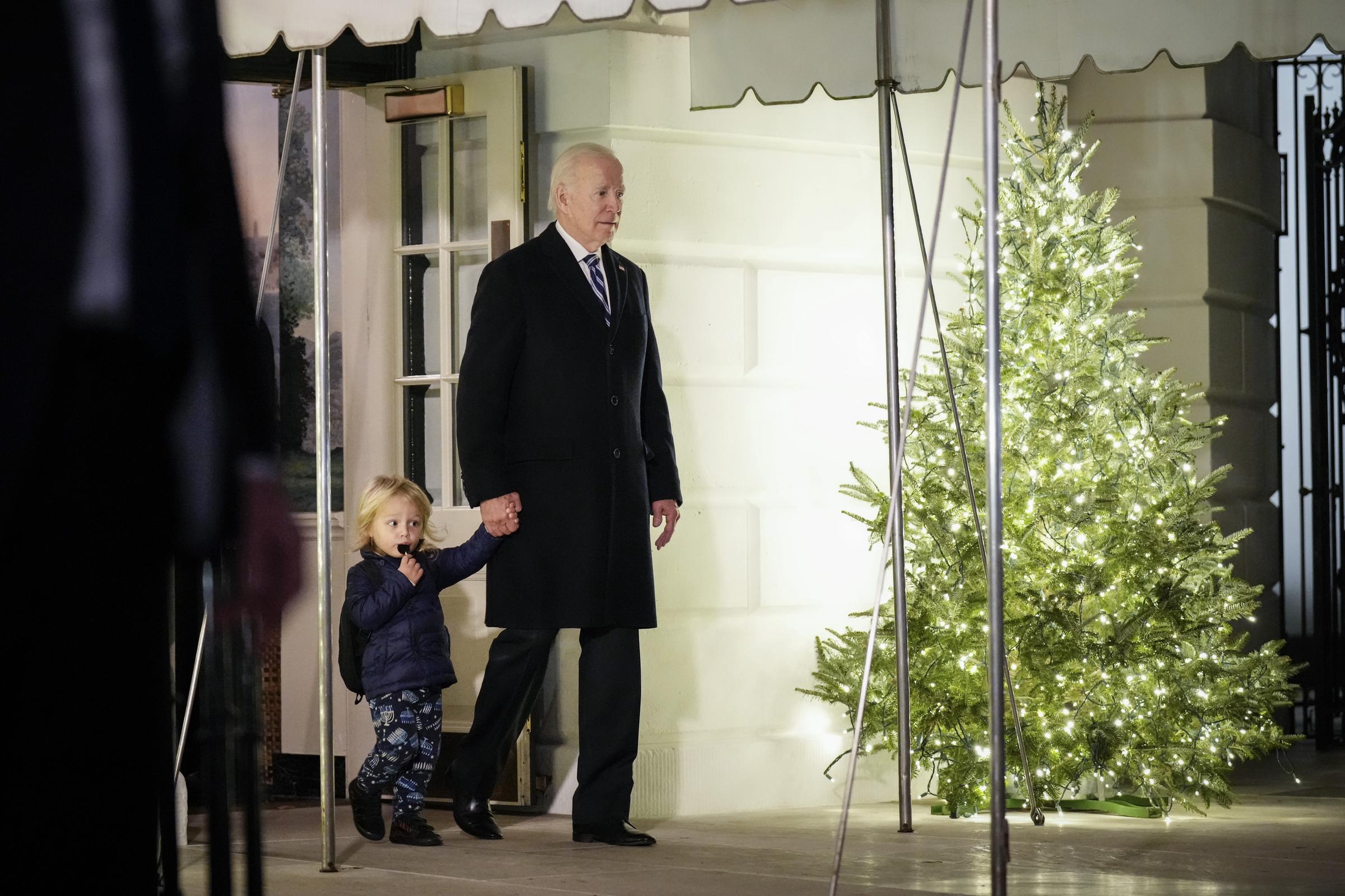 US President Joe Biden walks with Beau Biden Jr. as they go to Marine One on the South Lawn December 16, 2022, in Washington, D.C. | Source: Getty Images