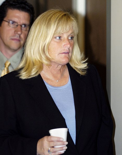 Debbie Rowe, Michael Jackson's ex-wife and mother of two of his children, steps from the courtroom during Jackson's child molestation trial at the Santa Barbara County courthouse April 28, 2005, in Santa Maria, California. | Source: Getty Images.