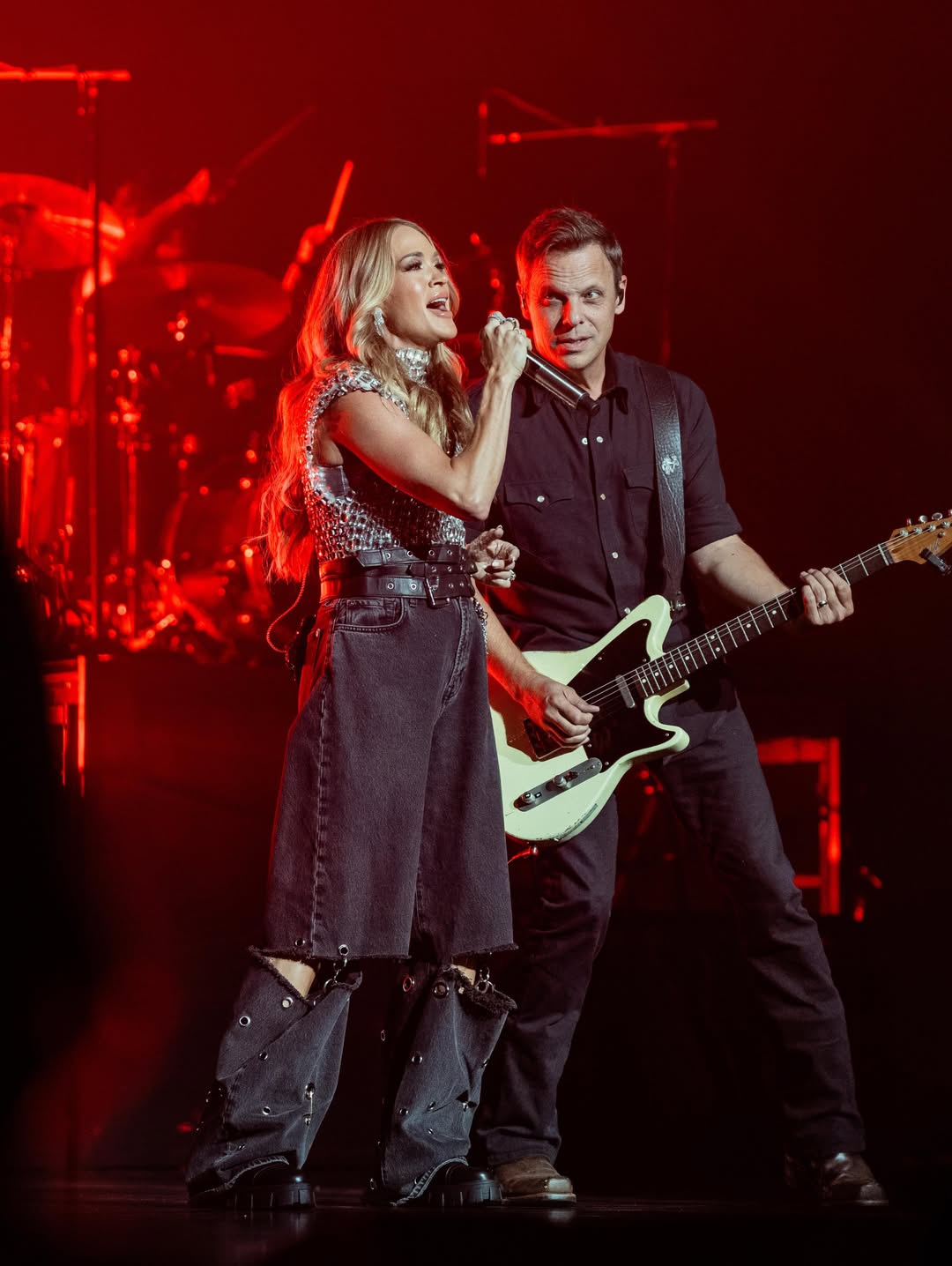 Carrie Underwood performs alongside a guitarist during a concert in Lincoln, California, on June 14, 2026 | Source: Instagram/carrieunderwood