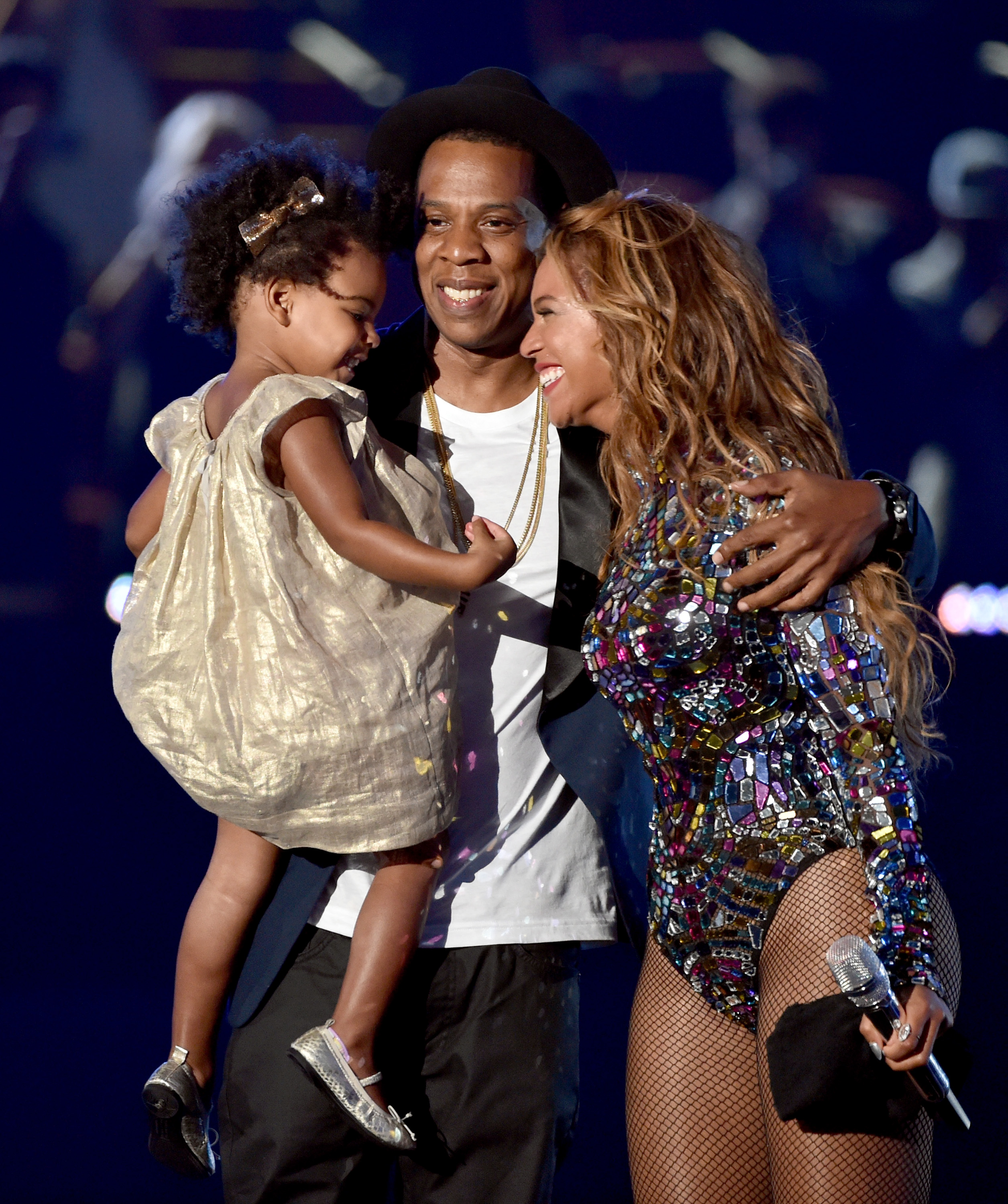 Rapper Jay Z and his wife singer Beyonce with their daughter Blue Ivy Carter onstage during the 2014 MTV Video Music Awards at The Forum on August 24, 2014 in Inglewood, California | Source: Getty Images