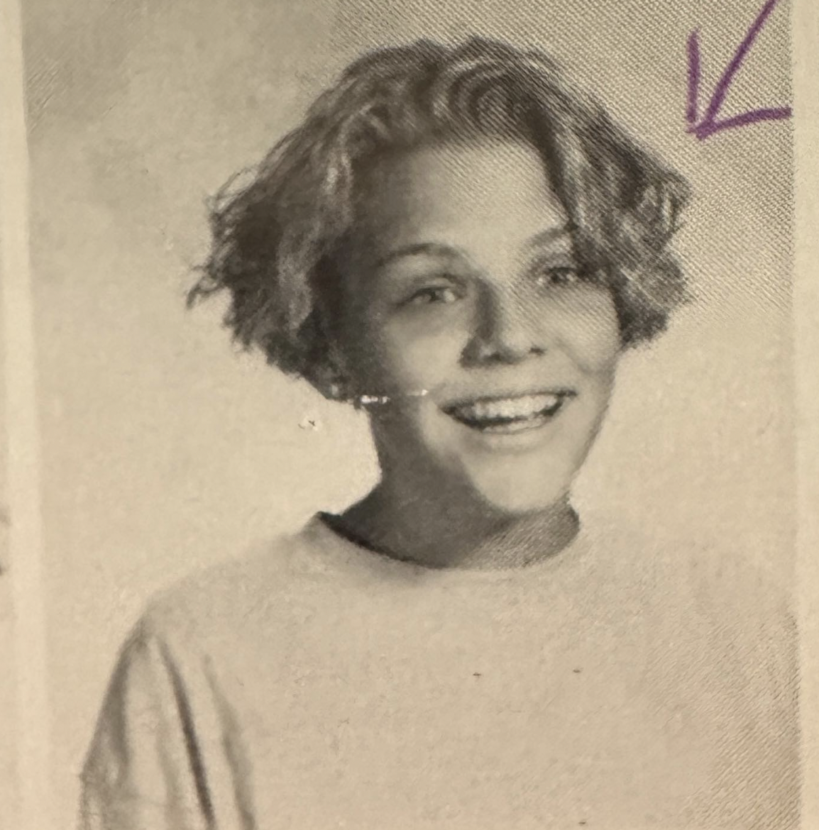 Busy Phillips' yearbook photo from a post dated May 11, 2023. | Source: Instagram/busyphilipps