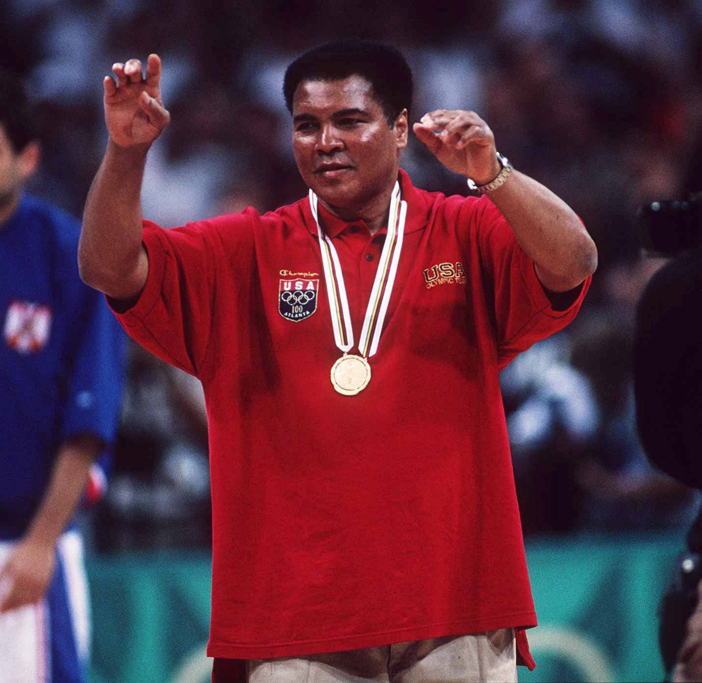 Muhammad Ali receives a replacement gold medal during at the 1996 Centennial Olympic Games on August 3, 1996, in Atlanta, Georgia. | Source: Getty Images