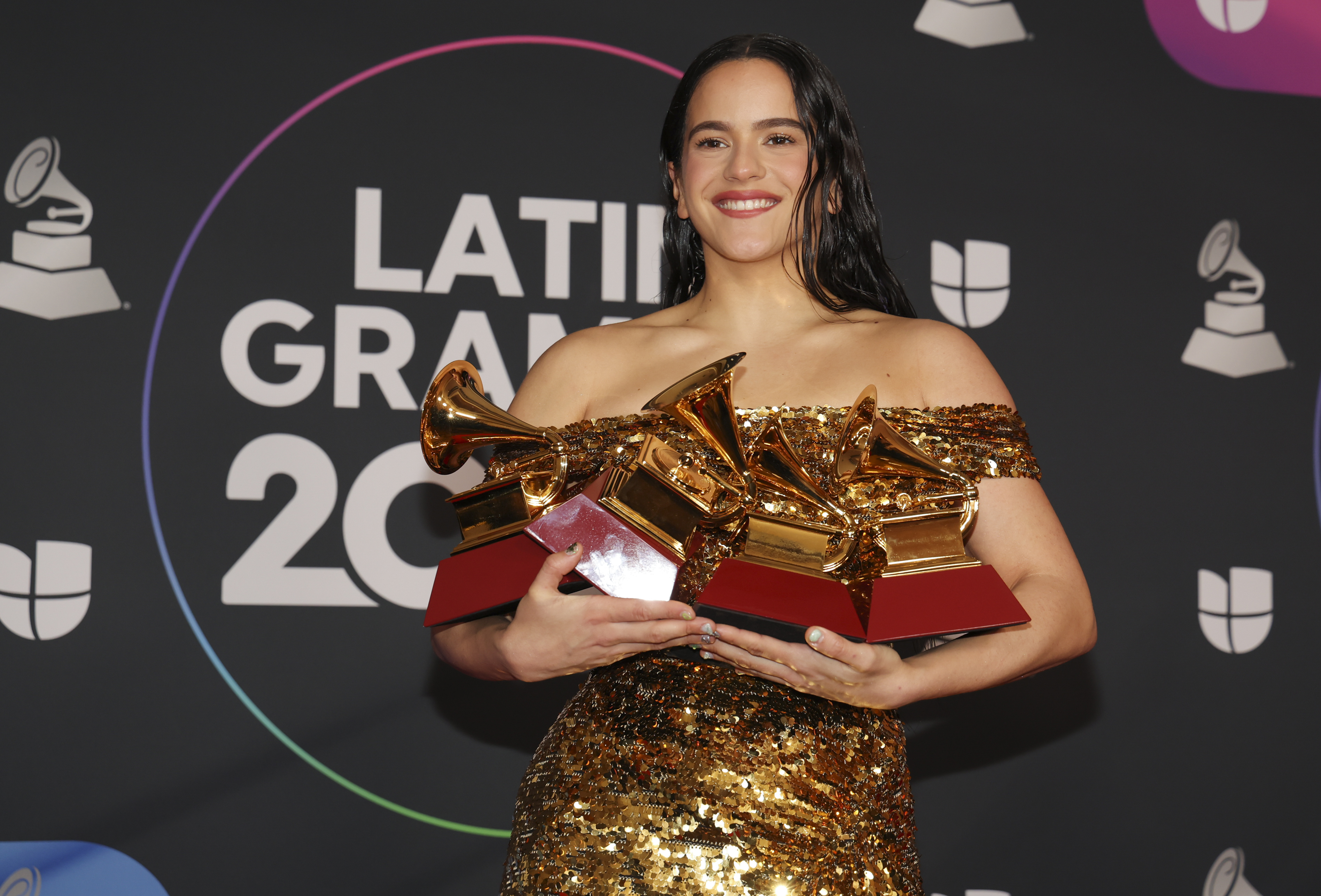 Rosalia with four of the eight Latin Grammy Awards she won at the 23rd Annual Latin Grammy Awards on November 17, 2022, in Las Vegas | Source: Getty Images