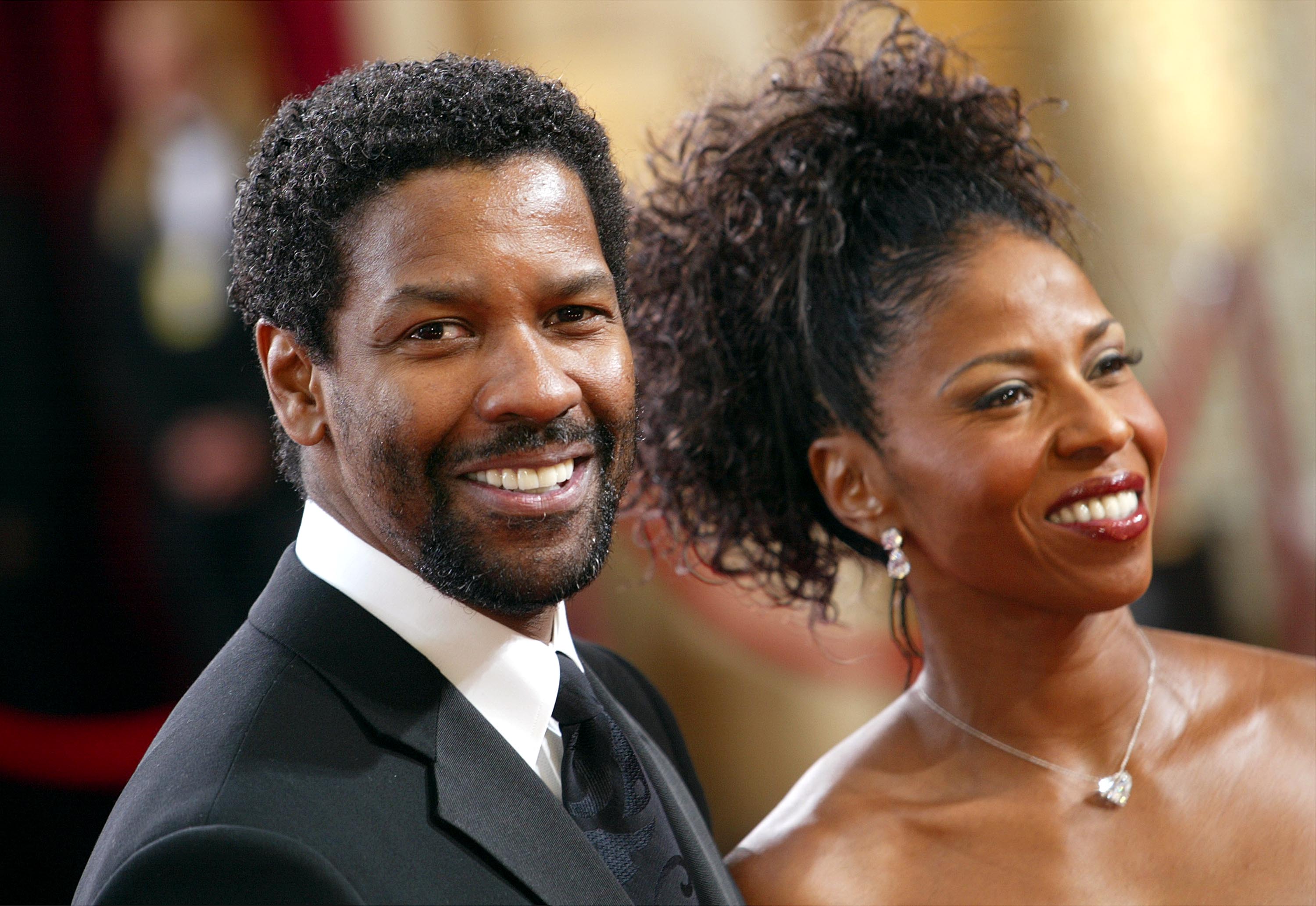 Denzel Washington and wife Pauletta attend the 75th Annual Academy Awards at the Kodak Theater on March 23, 2003 in Hollywood, California |  Source: Getty Images 