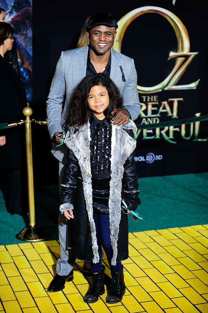 Actor Wayne Brady and daughter Maile Masako Brady arrive at the Los Angeles Premiere of "Oz The Great and Powerful" at the El Capitan Theatre on February 13, 2013 | Photo: Getty Images