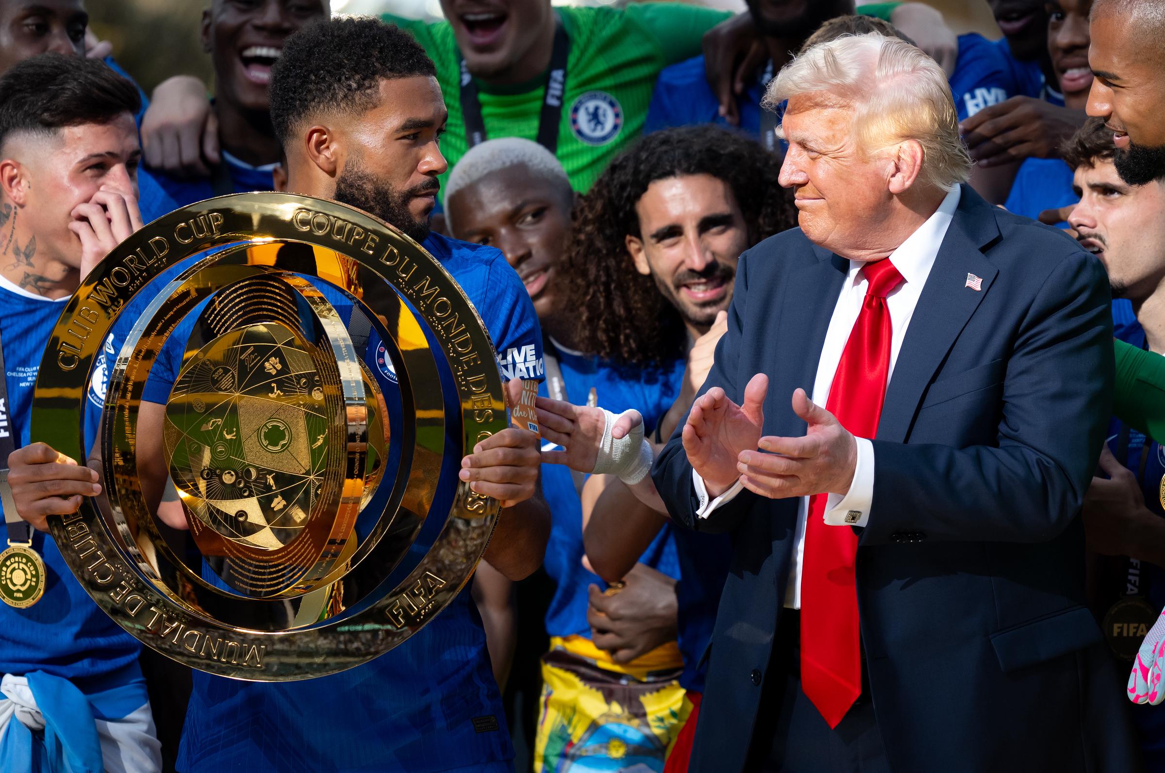 President Donald Trump and Chelsea FC celebrating the club's win at the FIFA Club World Cup at MetLife Stadium on July 13, 2025, in East Rutherford, New Jersey. | Source: Getty Images
