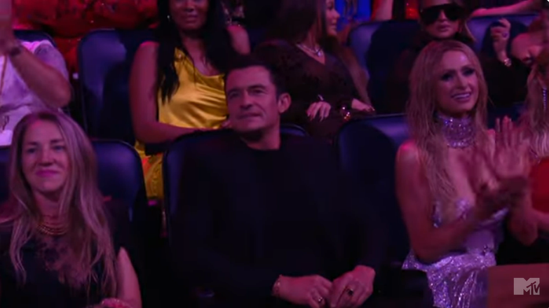 Orlando Bloom watches Katy Perry perform at the MTV VMAs, from a YouTube video, dated September 12, 2024 | Source: Youtube/@MTV