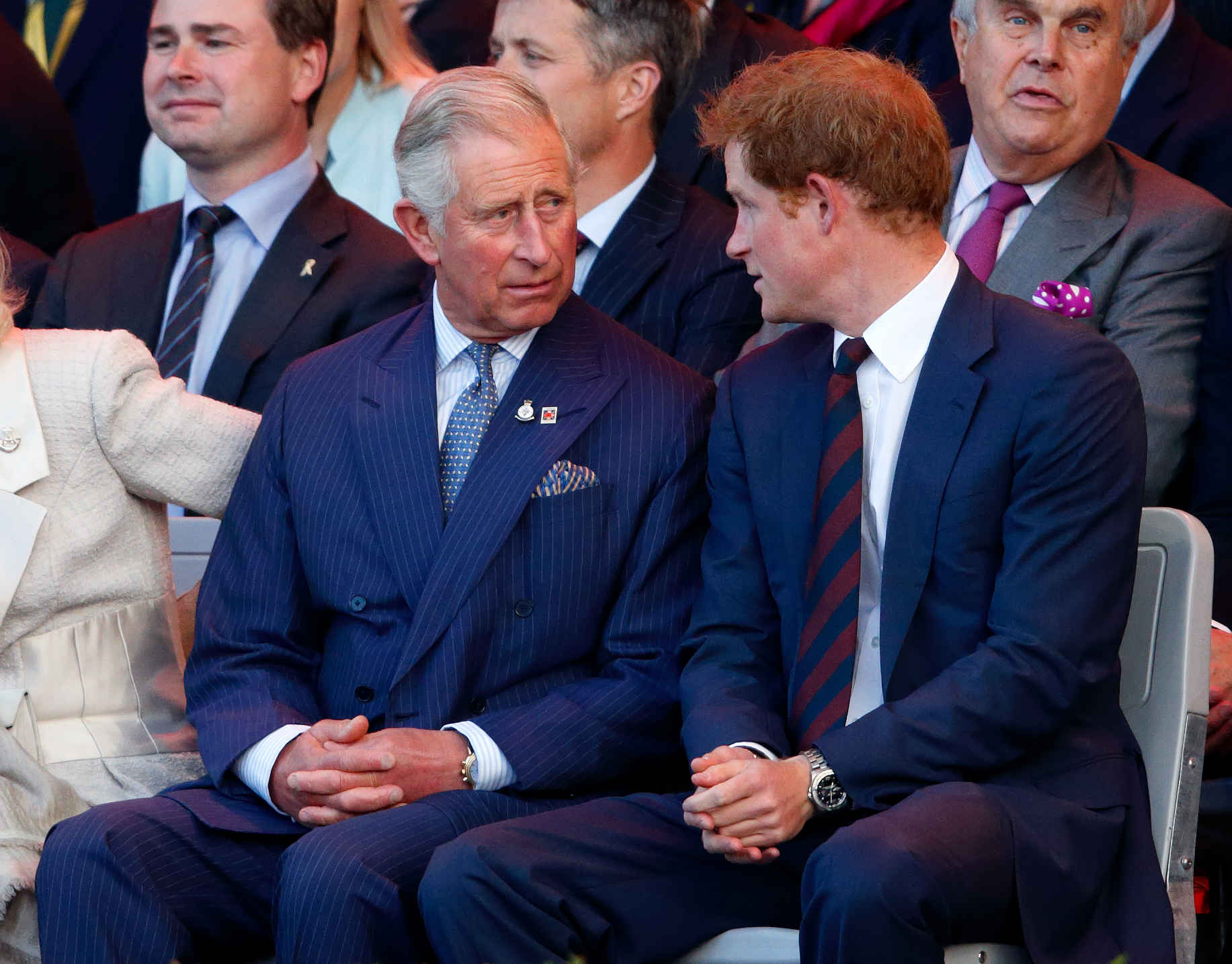 King Charles III and Prince Harry having a conversation during the the Opening Ceremony of the Invictus Games on September 10, 2014, in London, England. | Source: Getty Images