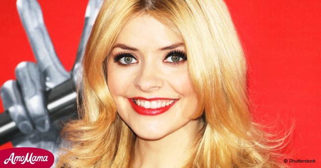 Holly Willoughby flashes her gorgeous neckline in plunging lemon suit during recent appearance