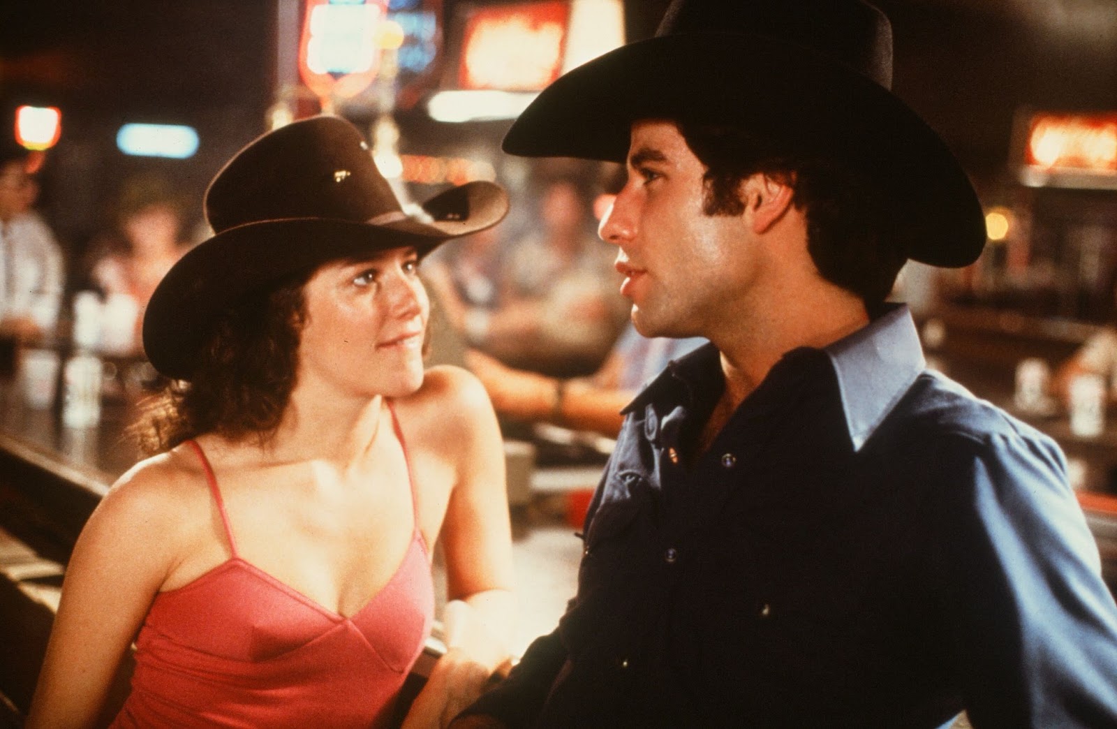 The '70s icon and John Travolta on the set of "Urban Cowboy" circa 1980. | Source: Getty Images